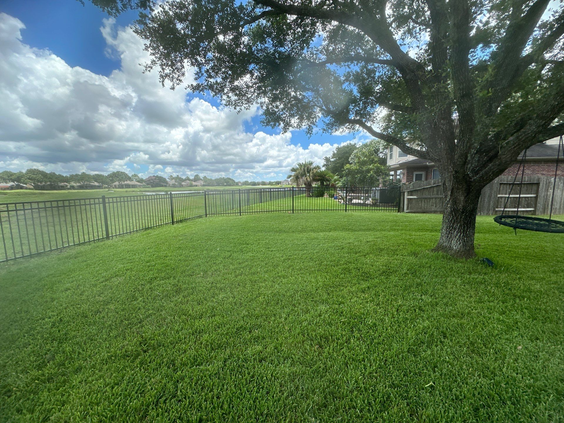 Stunning iron installation in Pearland by Tim's Fences