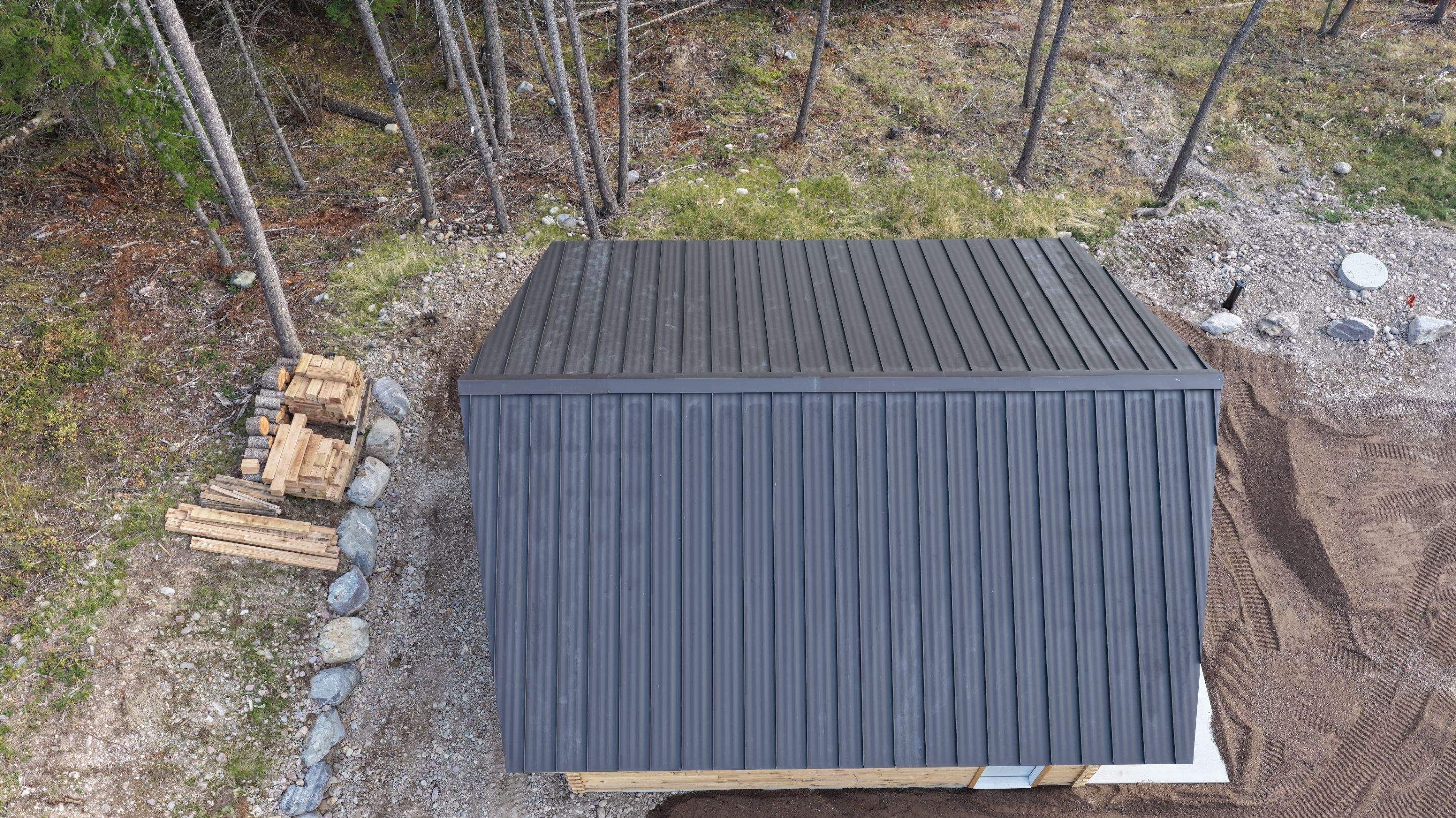 Mechanical Lock Standing Seam - CMG ULG Dark Bronze  by Montana Roofing Solutions