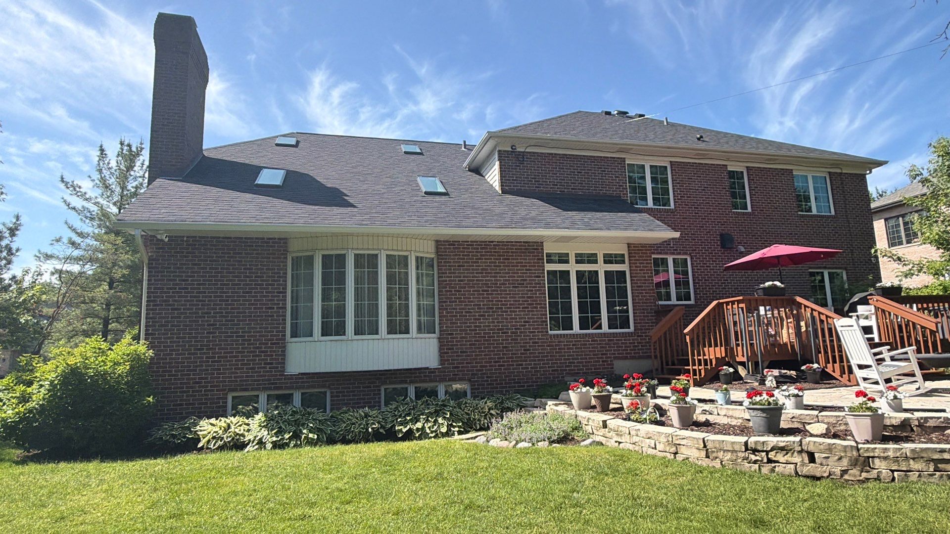 Asphalt Shingle Roof Replacement and Skylight Installation in Darien by Pro Home Services Inc