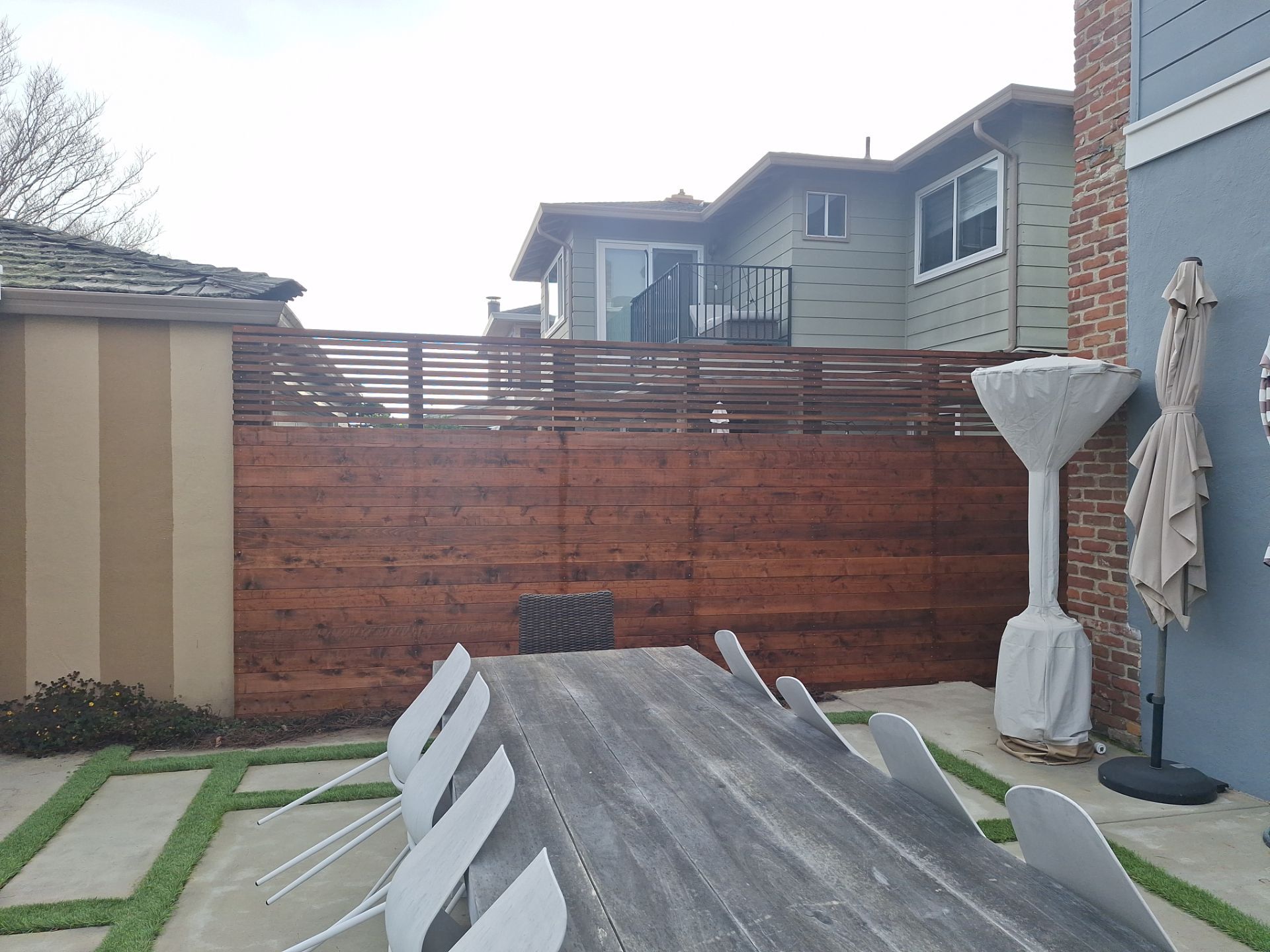 Horizontal T&G with Horizontal 1x2 Lattice by Fremont Fence Inc