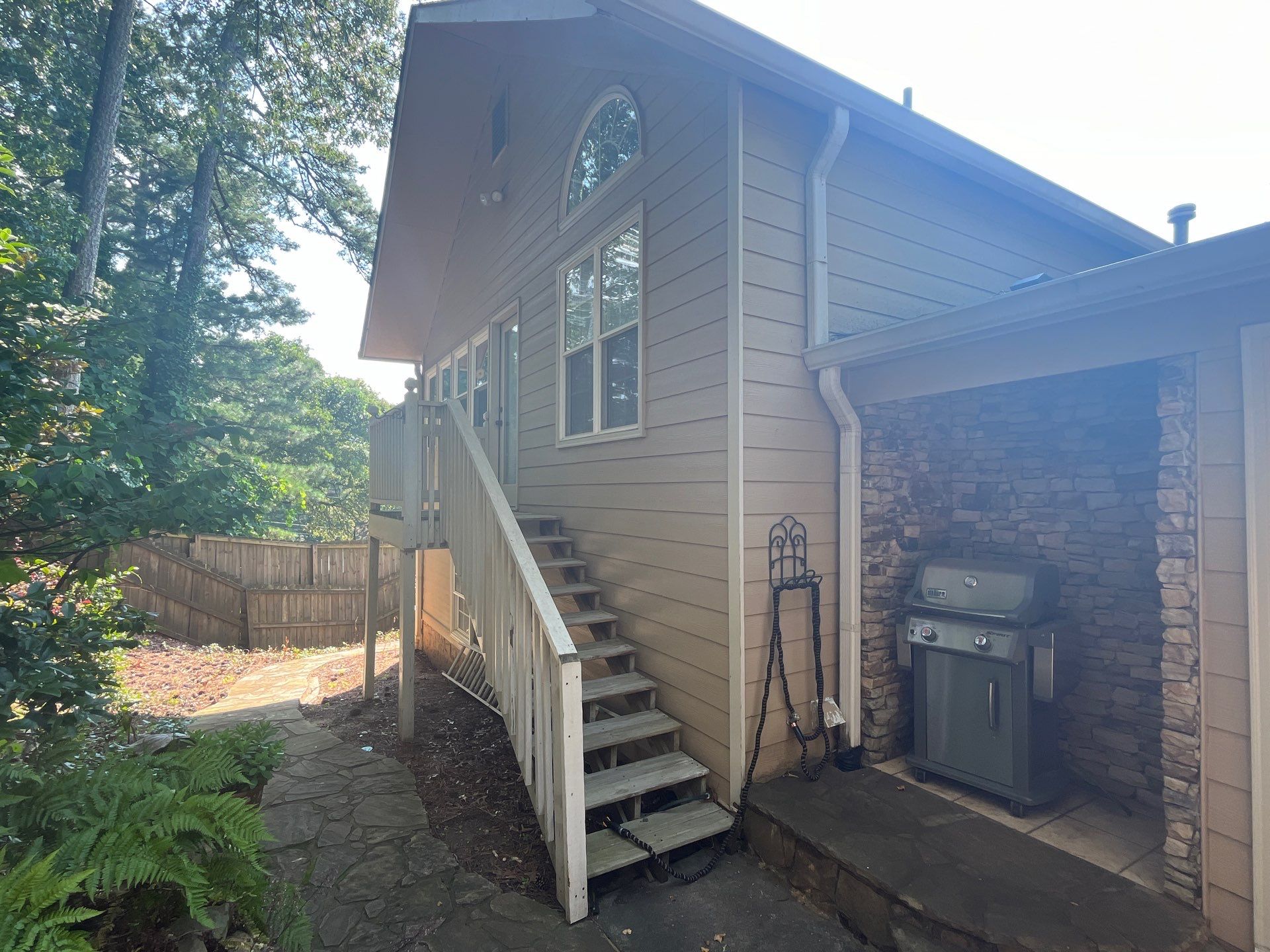Rotted Wood Replacement, Deck Stain, and Exterior Paint Project in Kennesaw, GA by Nelson Exteriors 