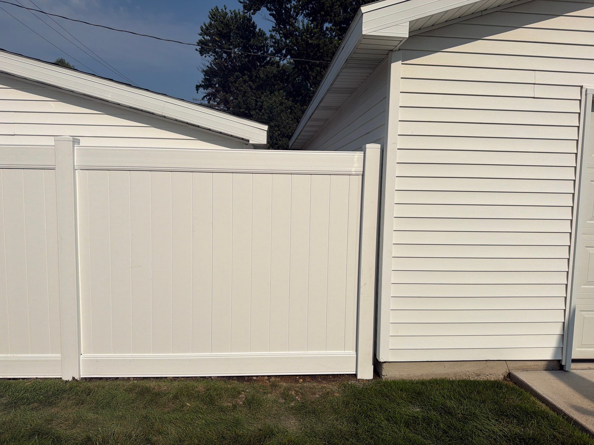 White Vinyl Privacy Fence Installation and Side Yard Upgrades in Waterloo by Perfect Picket Fence and Stain