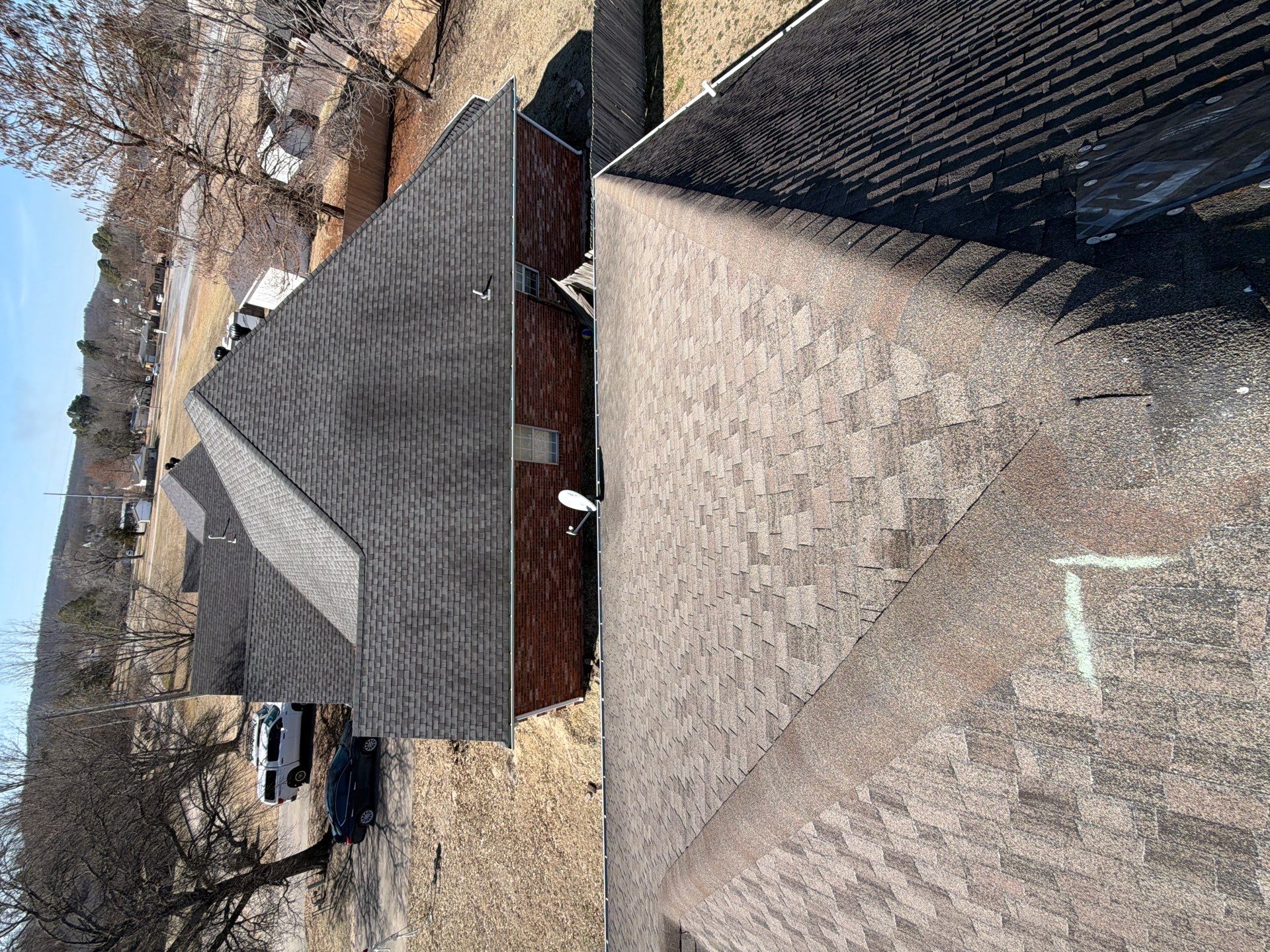 Black roof & gutters!! by In & Out Construction & Remodeling, LLC