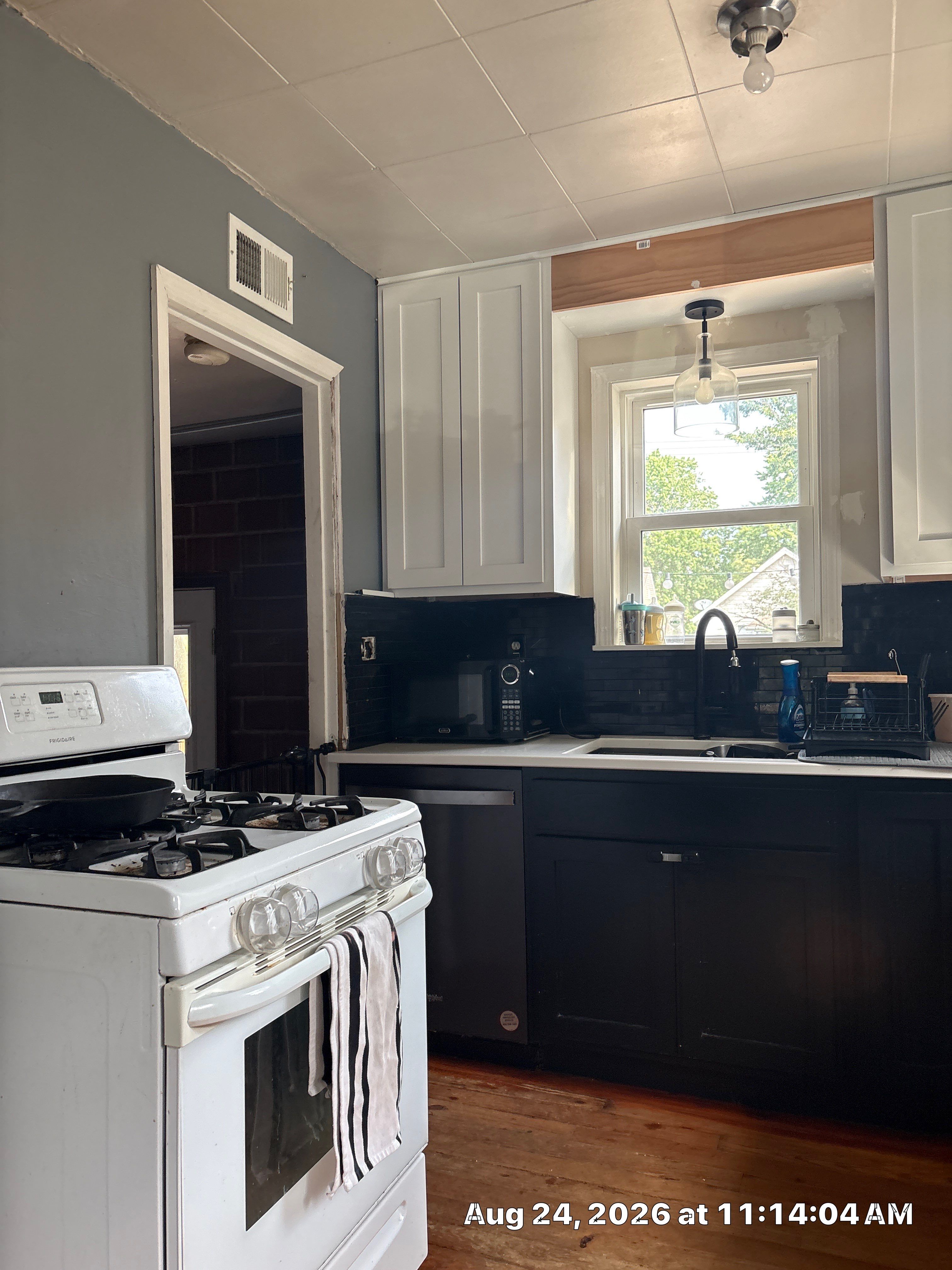 Modern Kitchen Renovation with Two-Tone Cabinetry in Lincoln by CompanyCam Sales Demo