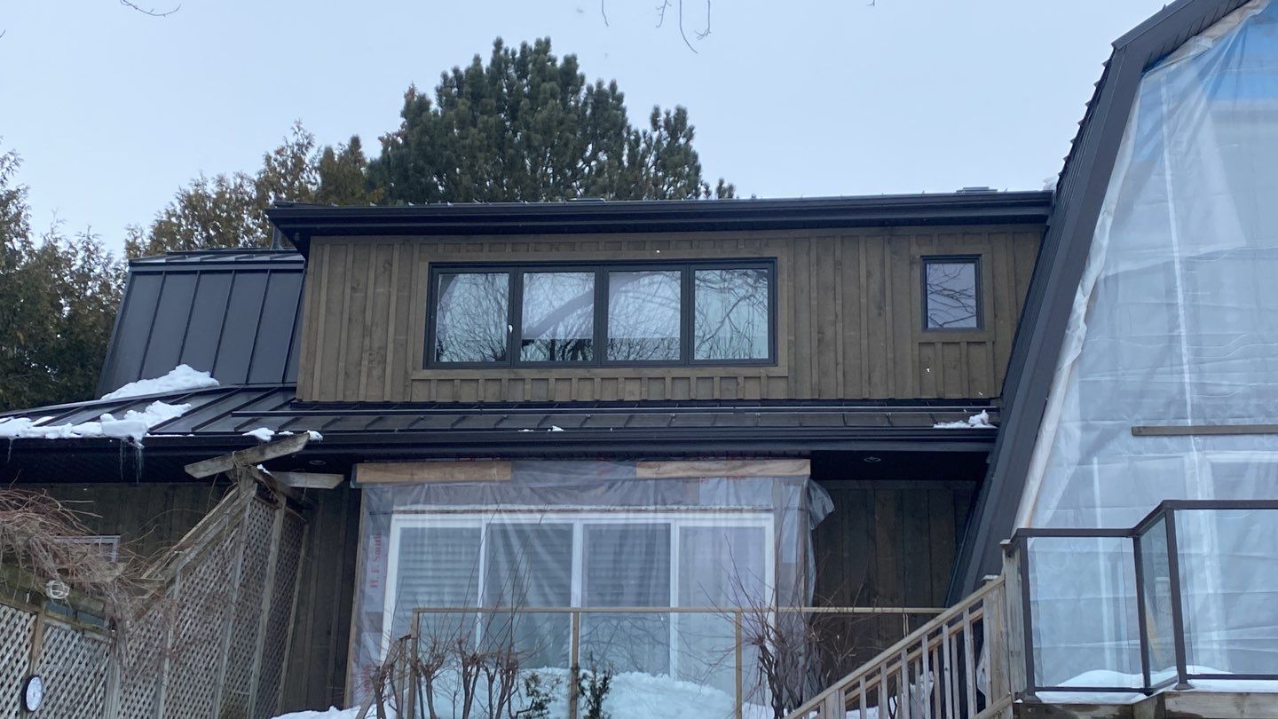 Residential Roofing Installation using 16" Standing Seam Panels by Jay Carter Roofing & Sheet Metal