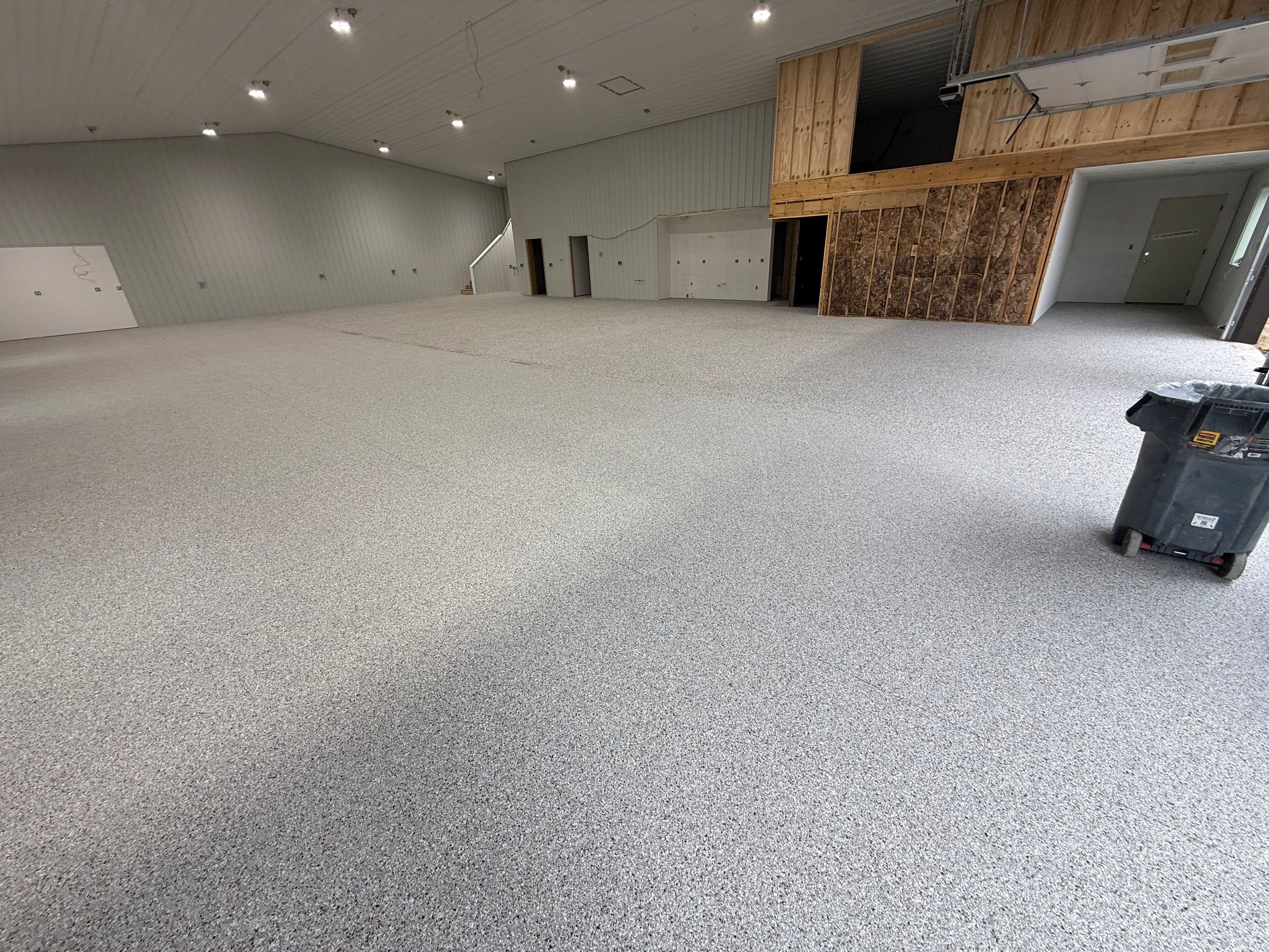 Custom Speckled Floor Coating for Large Montrose Shop by Select Painting, Coatings & Garage Cabinets