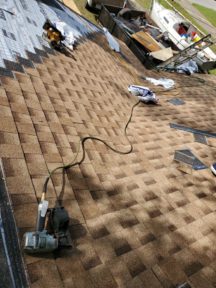 Residential Roofing Repair using Roof Replacement by American Roofing & Construction LLC