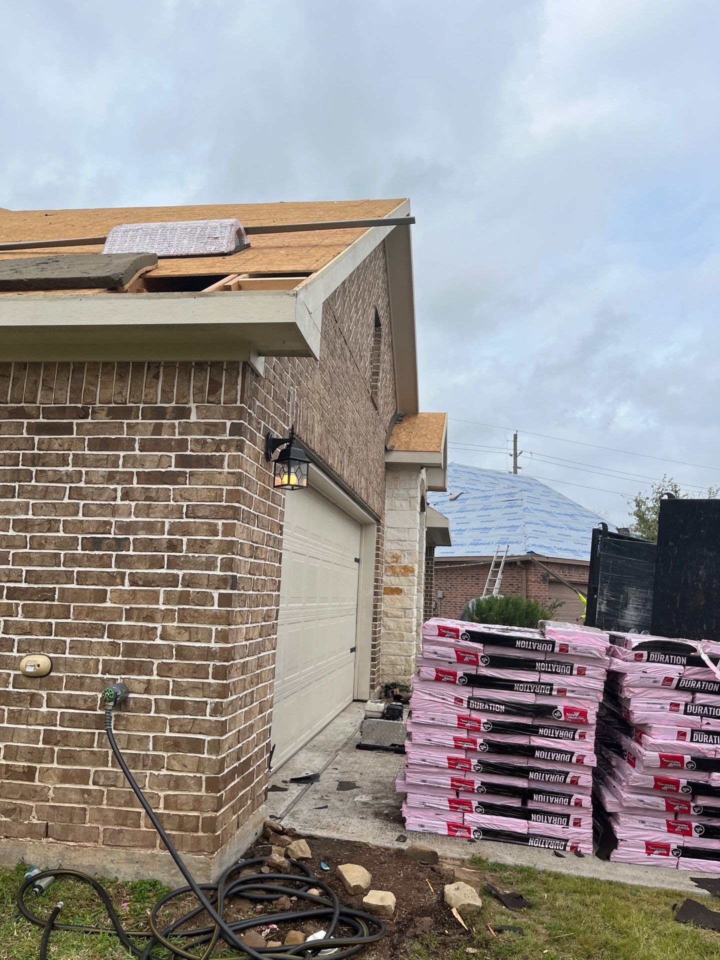 Hail Damage using Owen's Corning Duration (Lifetime) Shingles by Roof Repair Company