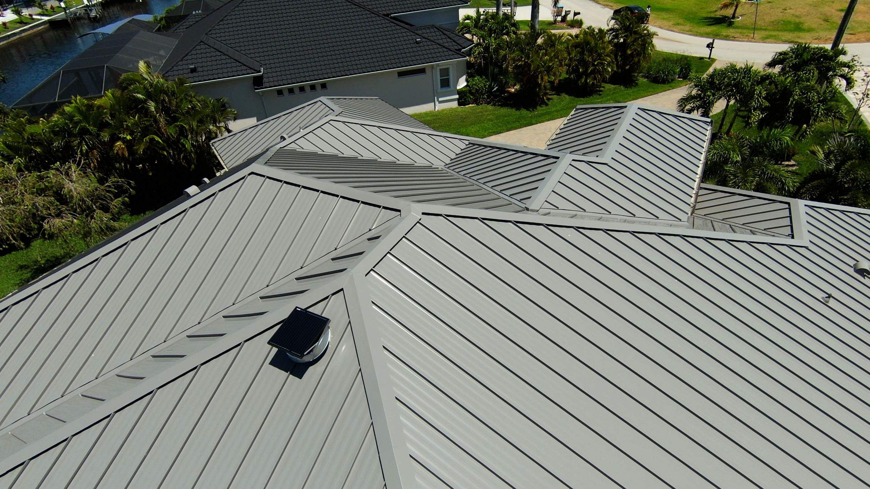 Residential Roofing Installation using Gulf Coast Metals Gulf Seam Panels by Four Peaks Roofing