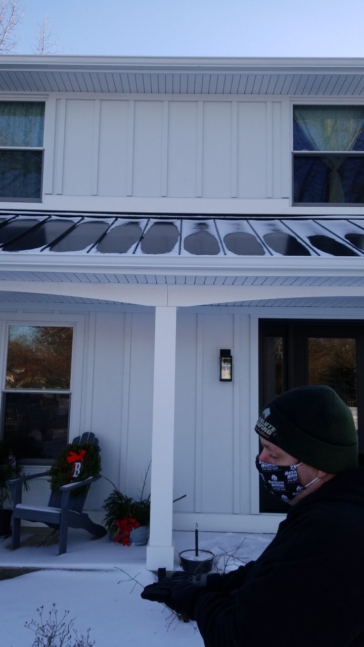 James Hardie Siding  using James Hardie Board and Batten, White by Absolute Roofing and Construction