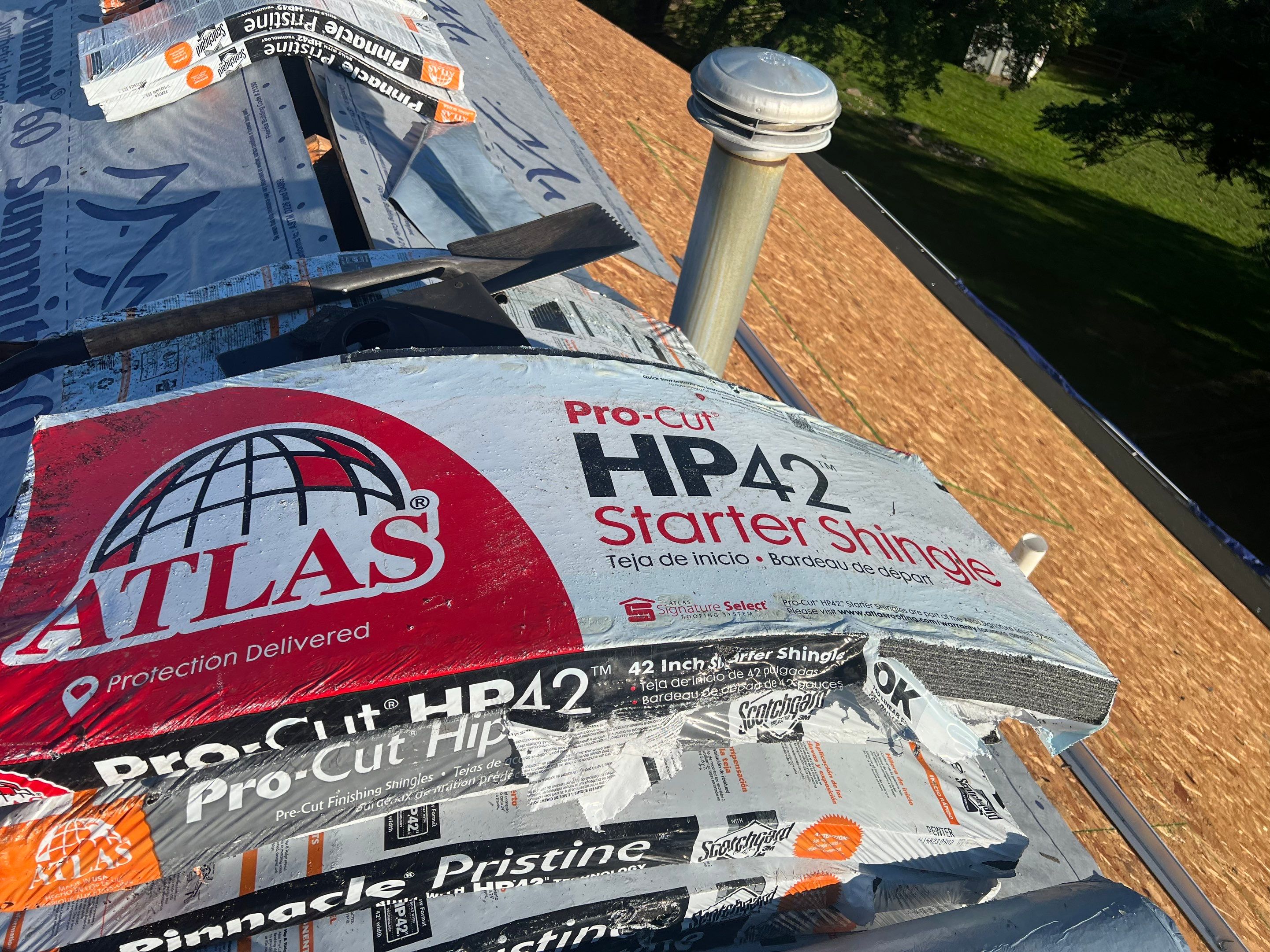 Residential Roofing Installation using Atlas Pinnacle Pristine Pewter Architectural Shingles by Frederick Roof Repair