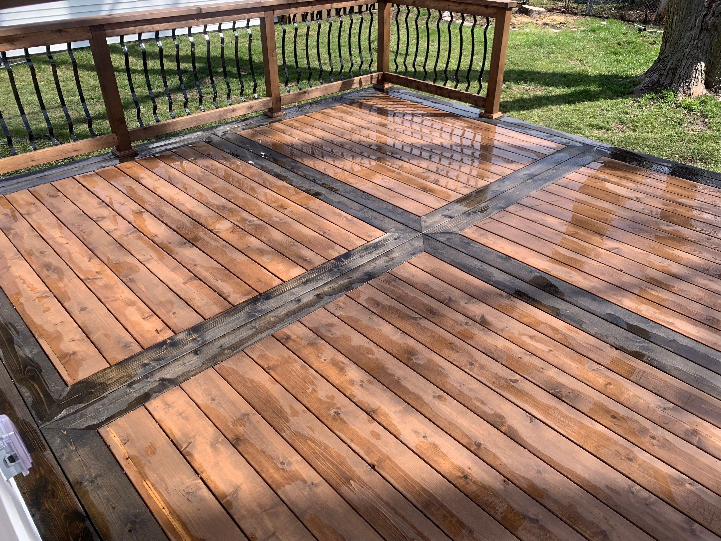 Deck re stained  by Cutting edge painting 