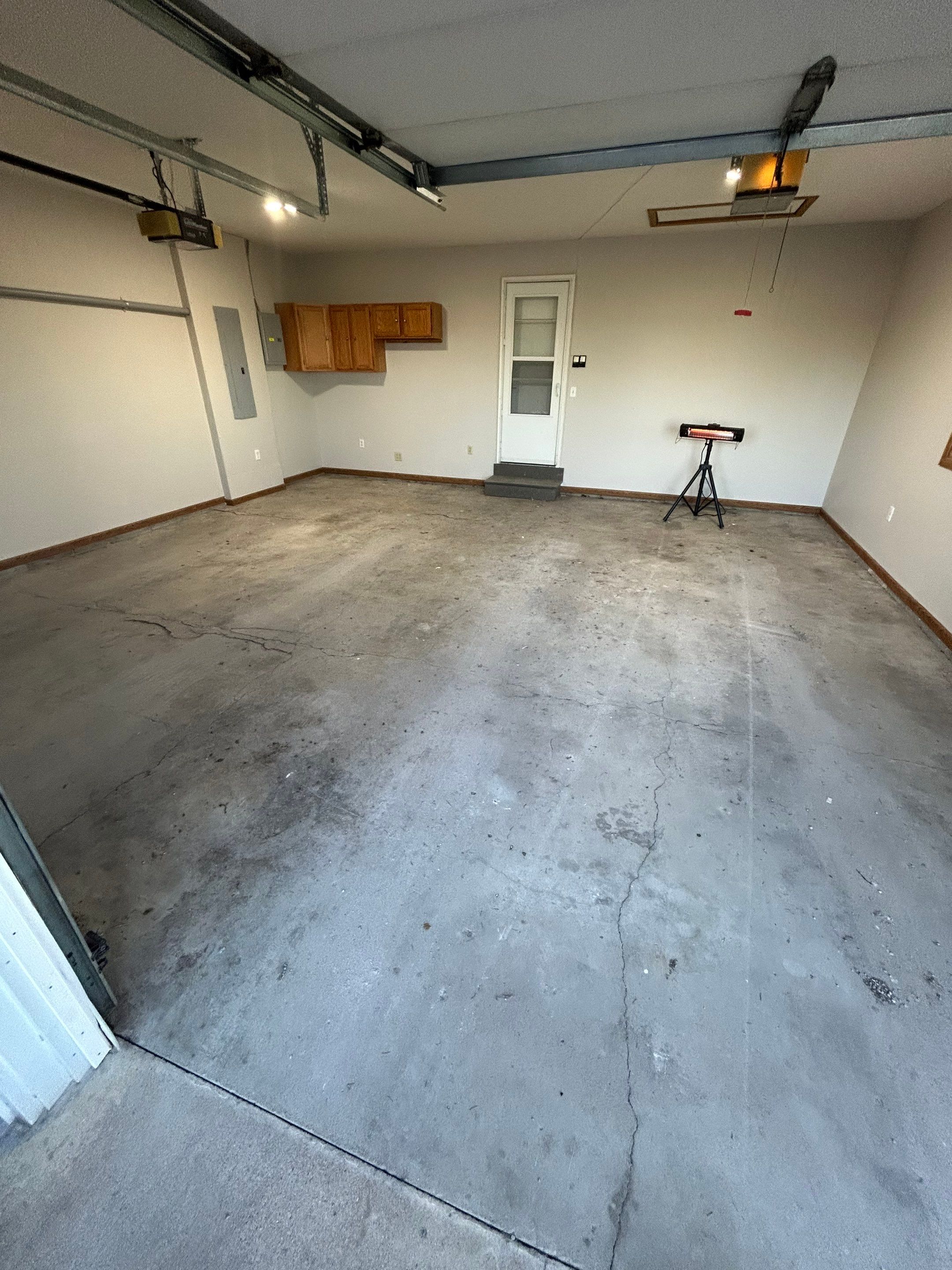 Epoxy Garage Floor Transformation and Concrete Repair in Beatrice by Goat Coatings