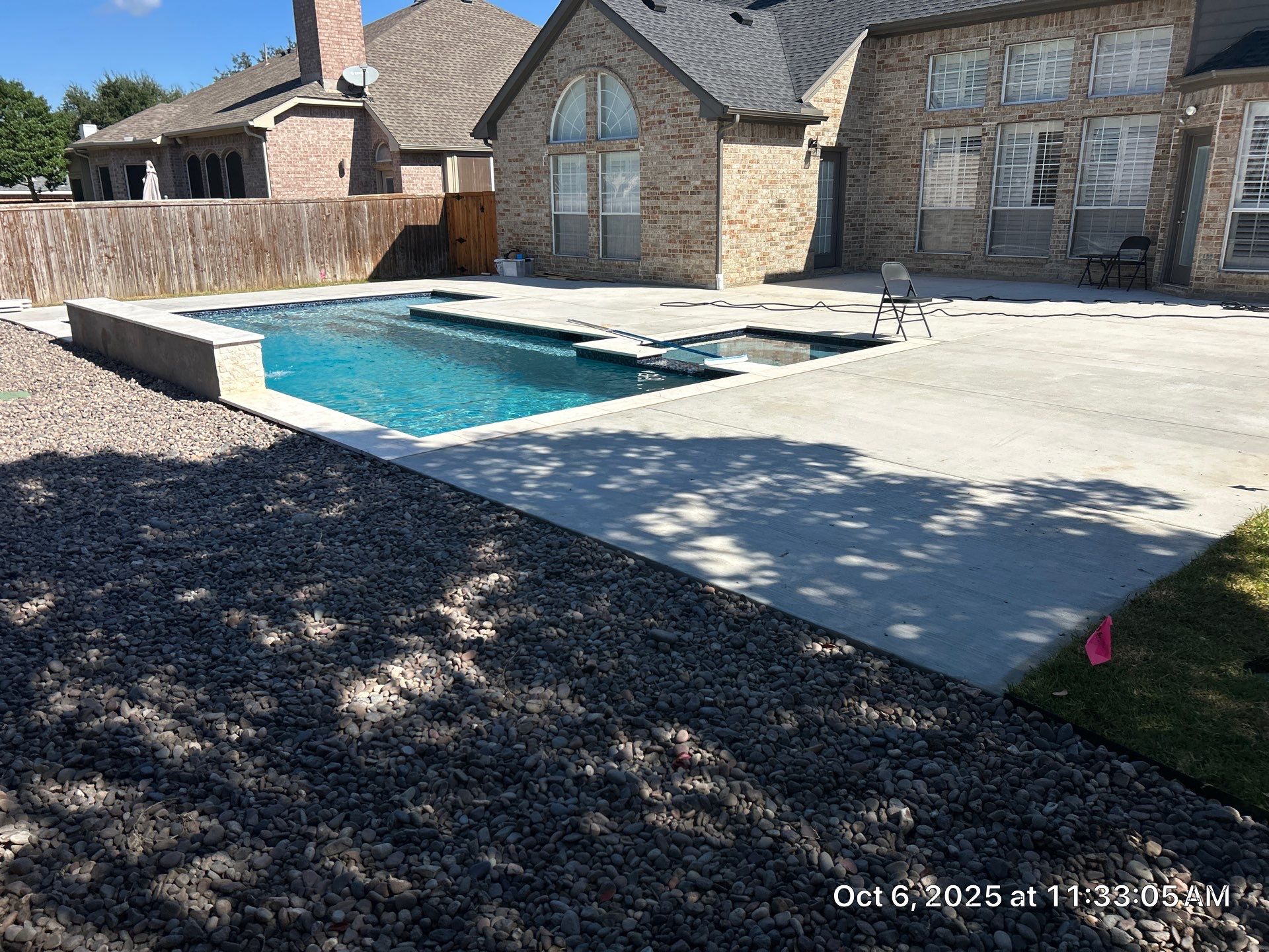 Geometric Pool with Tanning Ledge by Pinnacle Pools and Spas - DFW