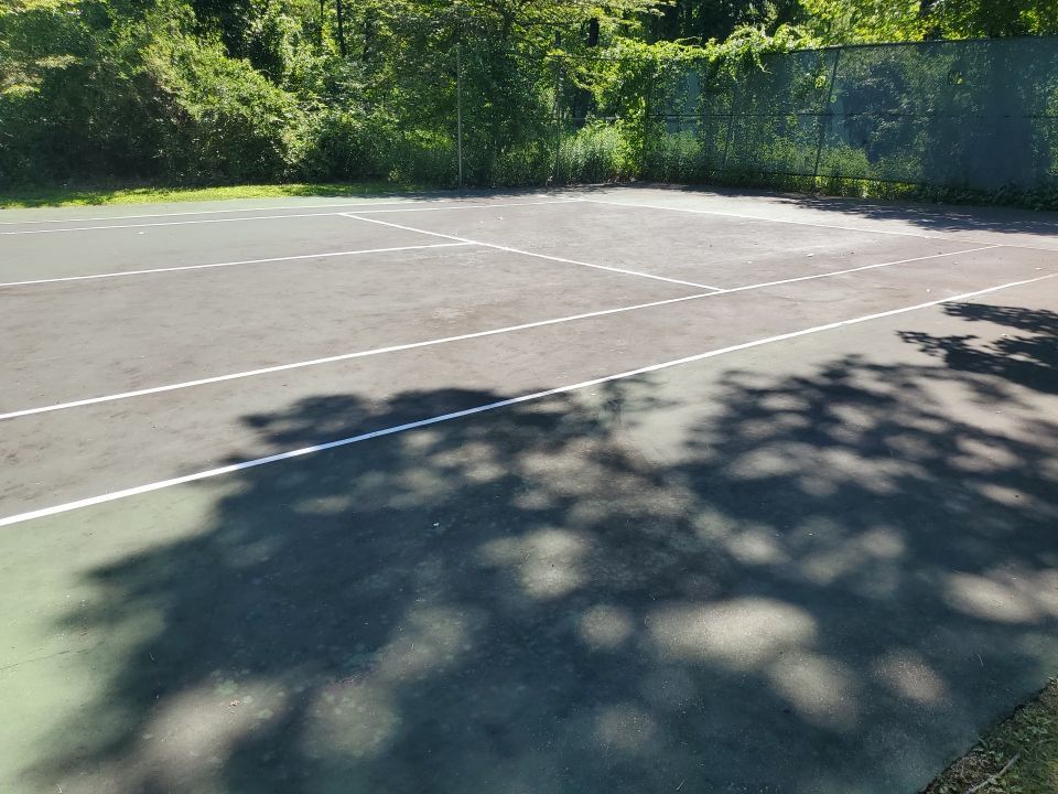 Deck, Patio, and Tennis Court Cleaning by Northern Power Washing LLC.