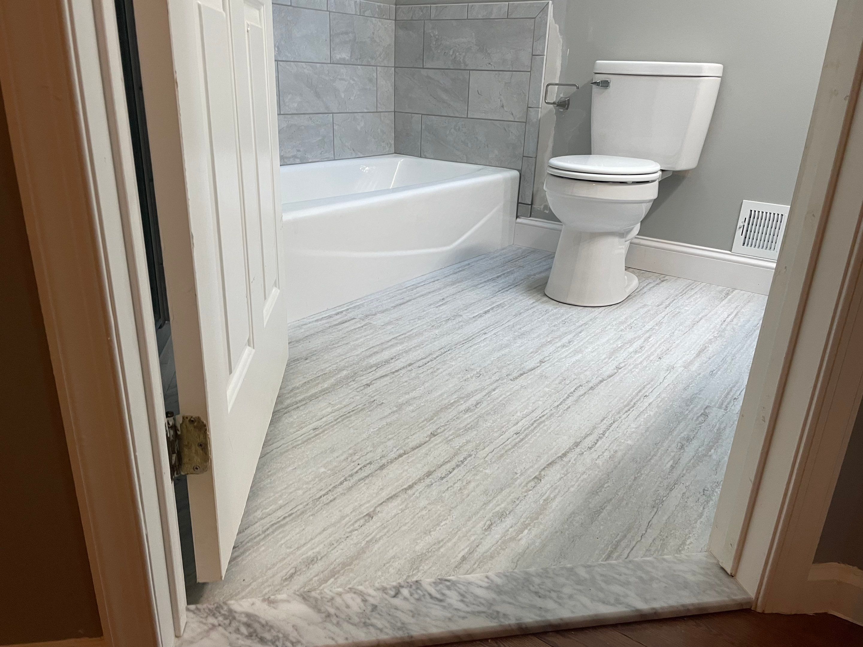 Bathroom Remodel using Tile by Home Concepts Construction