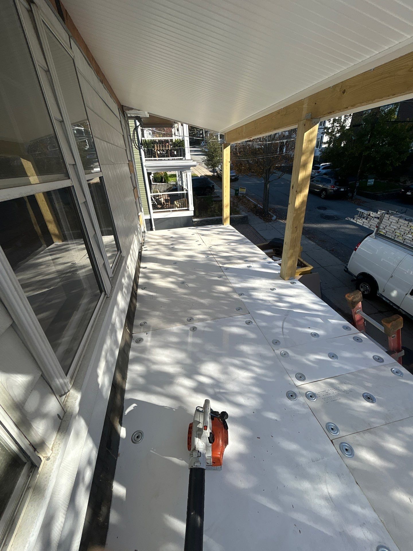 Watertown Porch EPDM Rubber Roof Installation by Mighty Dog Roofing of Greater Middlesex County