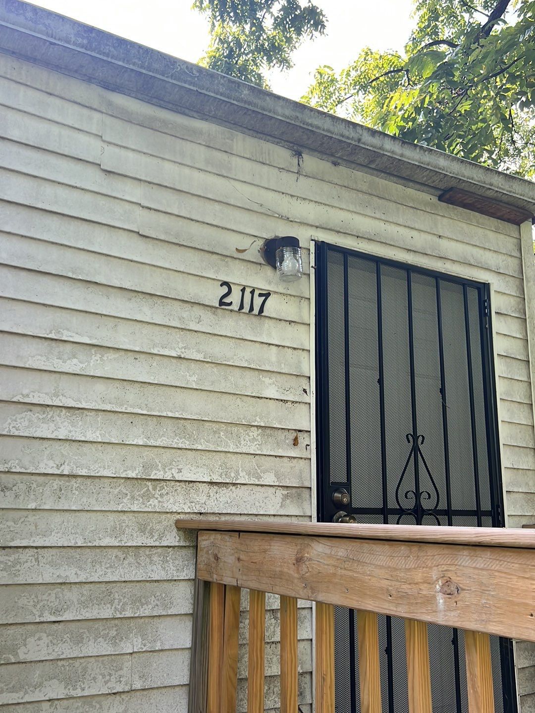 Rental Property Restoration, siding, flooring, gutters, landscaping by Storm Contracting 