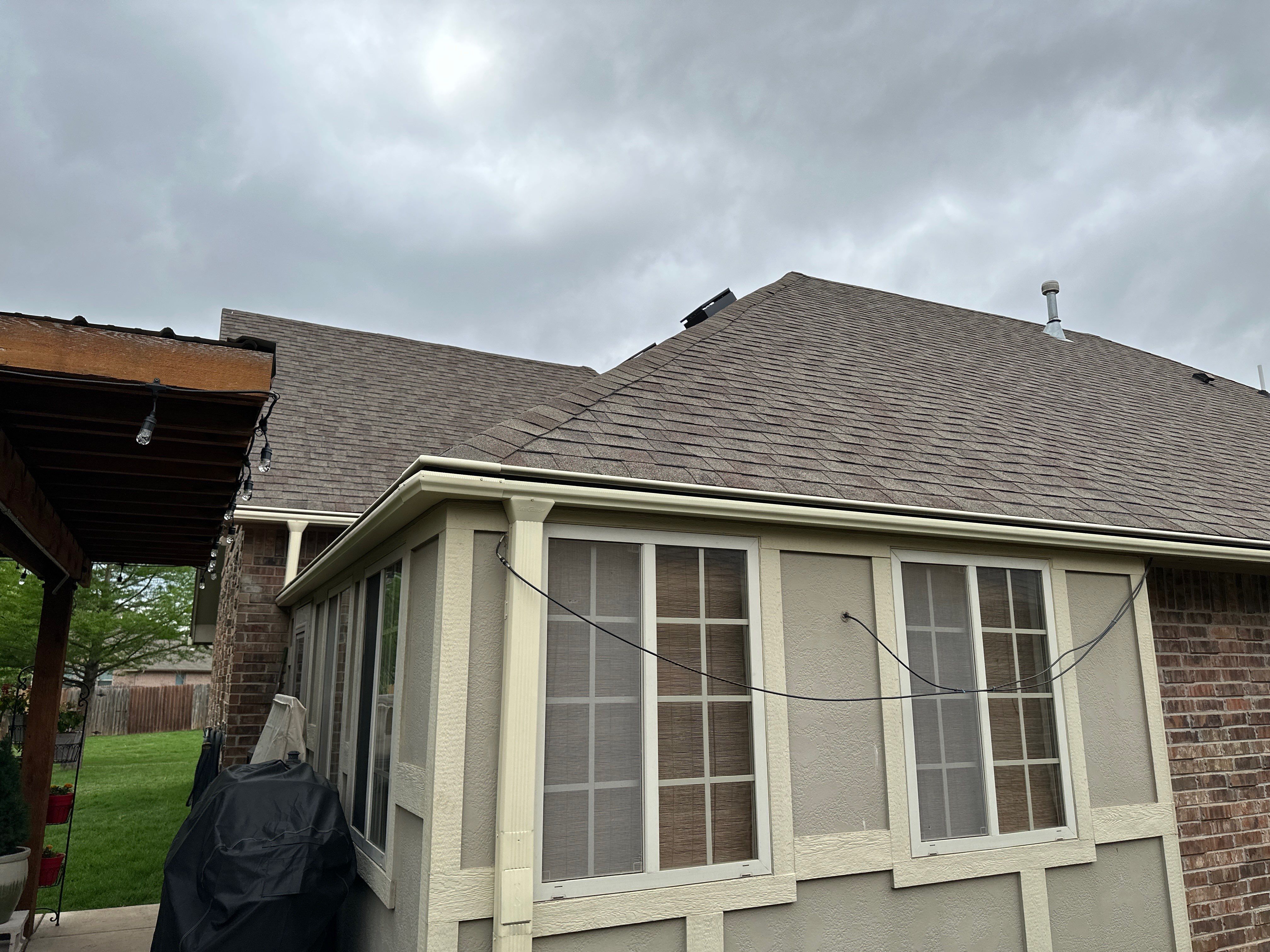 Reroof using Owens Corning Duration Storm IR in Driftwood by Castillo Roofing