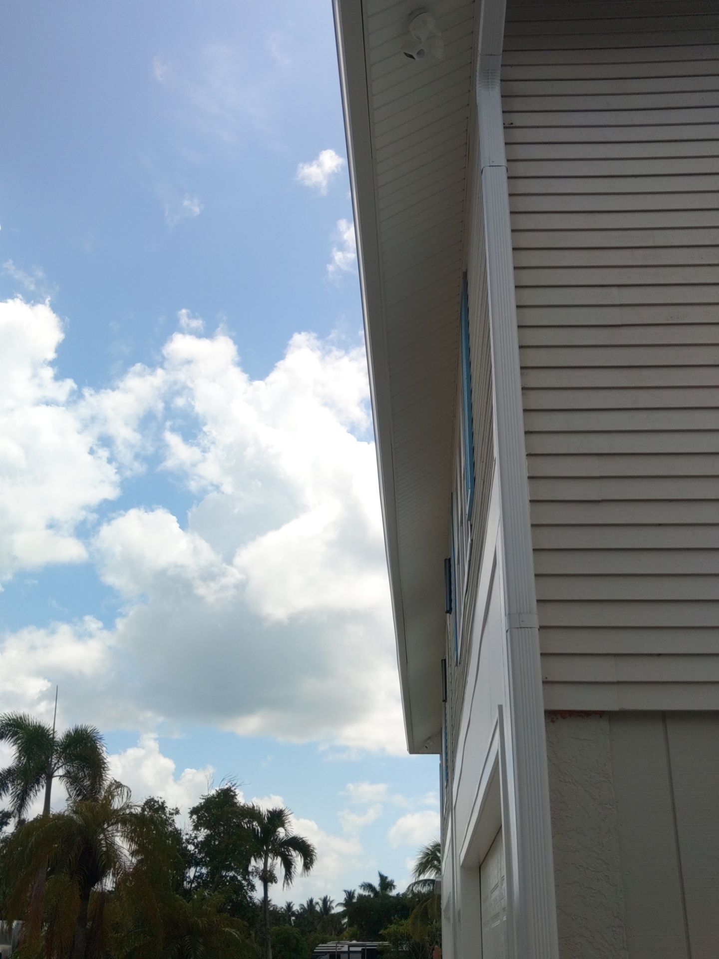 Complete Gutter System with Downspouts & Guards in Fort Myers Beach FL by Gutter Professors