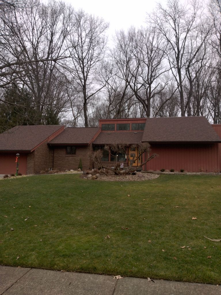 Residential Roof Replacement by Absolute Roofing and Construction