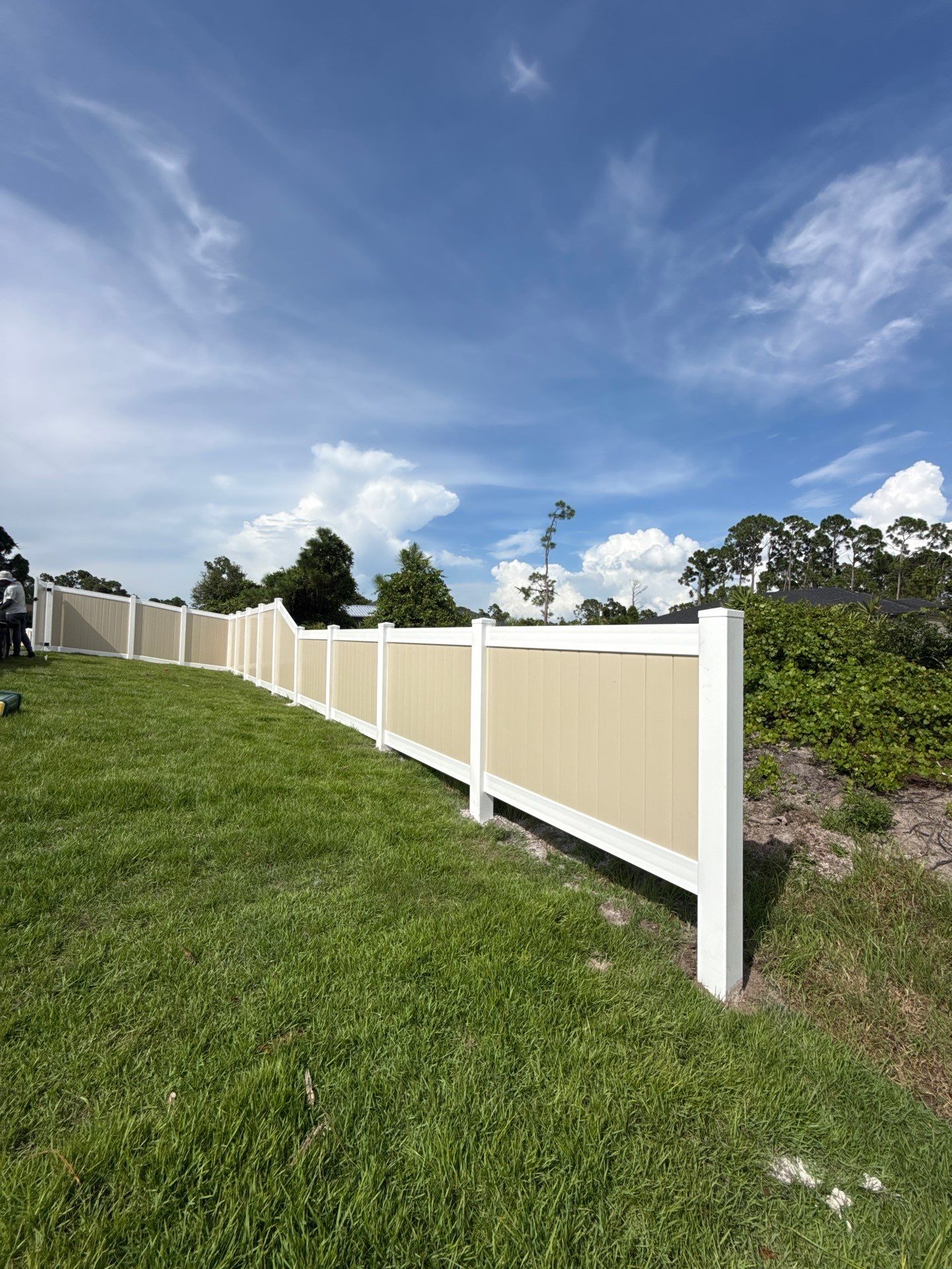 Custom Two-Tone Vinyl Privacy Fence Installation in North Port by True Fence LLC