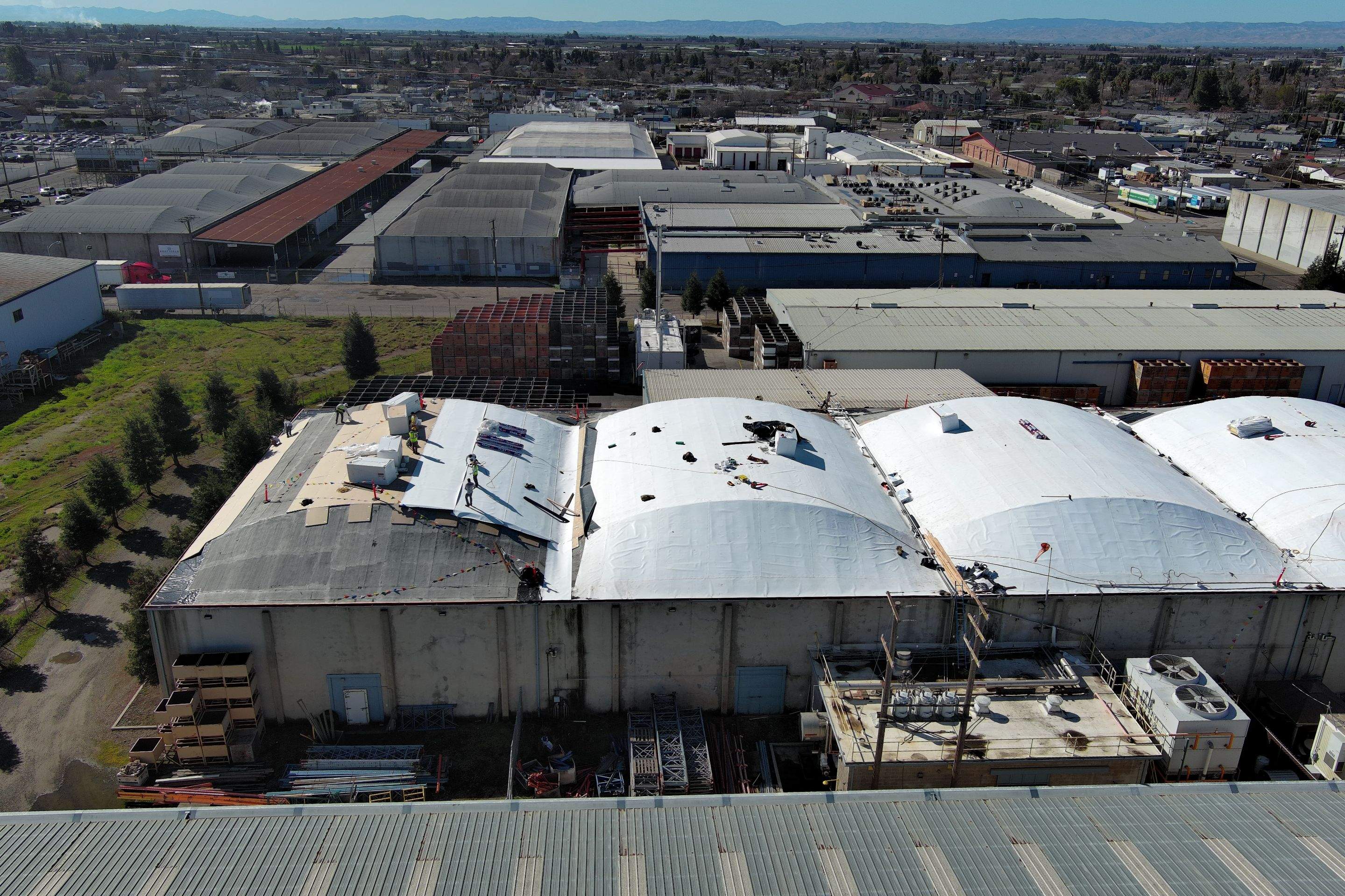 TPO single-ply roofing system using GAF Single-ply TPO 60 mil with 1.5 inch ISO board insulation by Straight Edge Roofing Inc