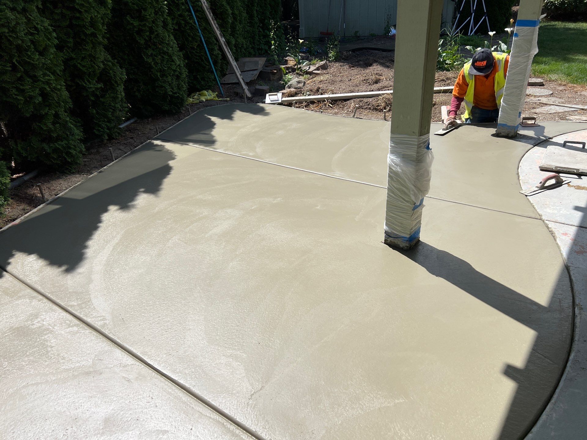 Ashley | Concrete Back Patio by Jireh Asphalt & Concrete Inc 