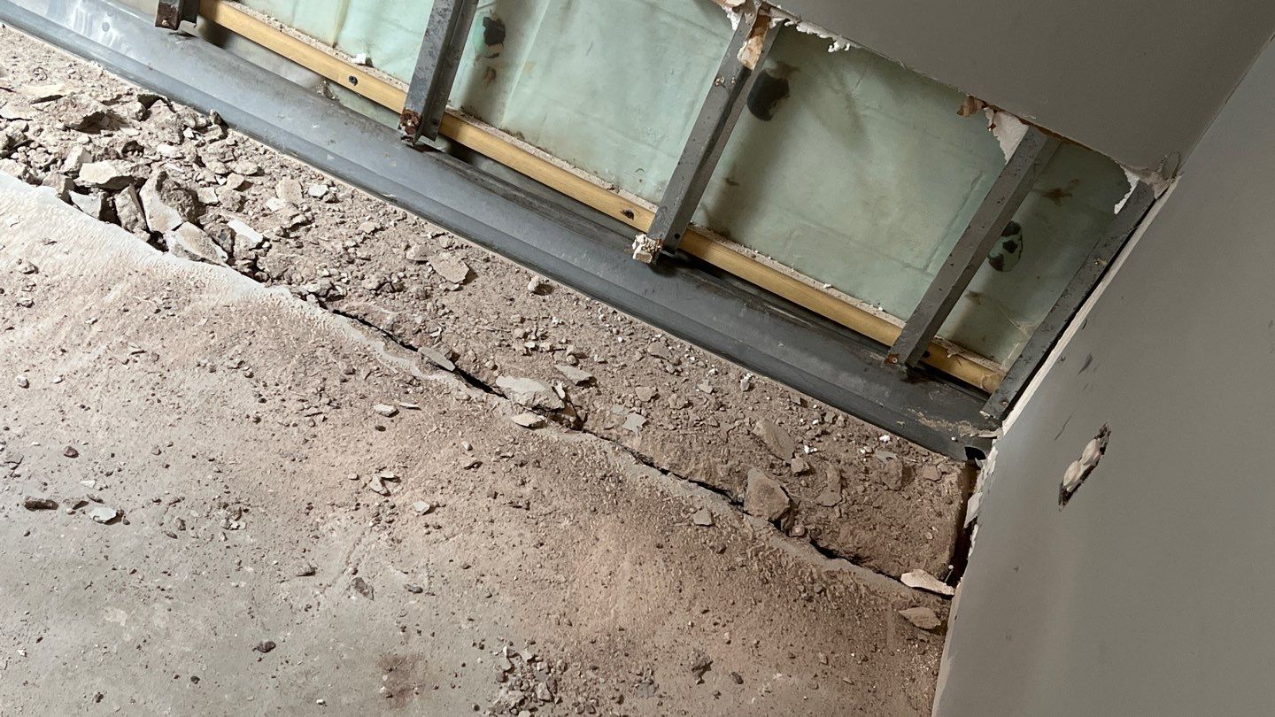 Interior drain tile system installation by ACE Waterproofing & Basement Solutions