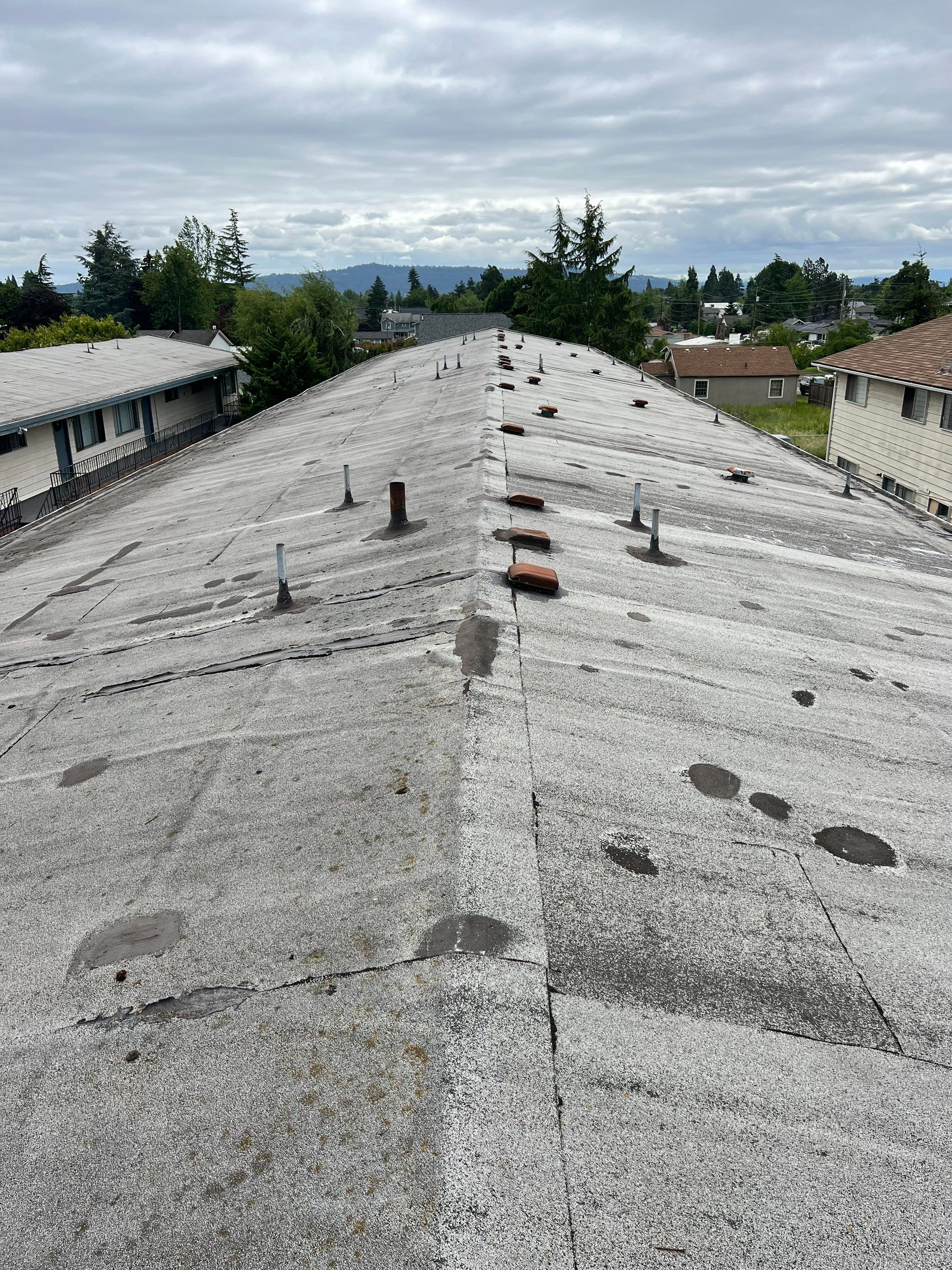 Commercial Flat Roof Installation using GAF 60Mil TPO  by Orezona Building & Roofing Company, Inc.