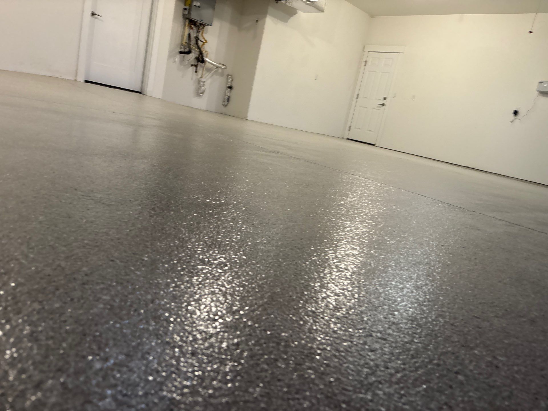 Garage Transformation using Limestone Hybrid by Croc Coatings, LLC