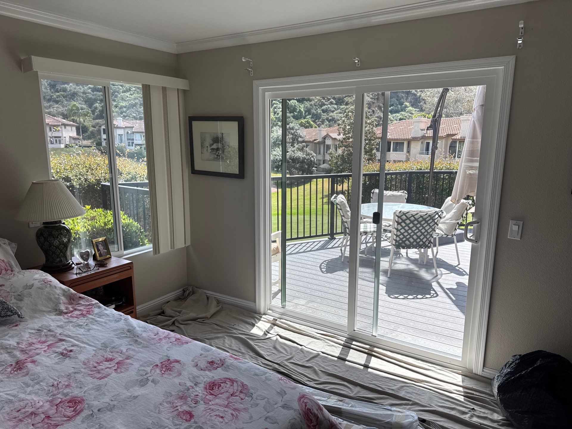 Custom Roller Shade and Floral Pattern Window Covering Installation in Solana Beach by Q Blinds