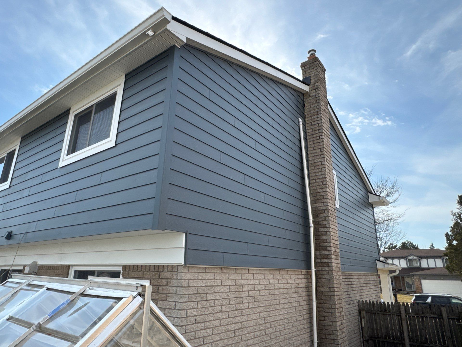 Siding Replacement using Alside Midnight Blue by 180 Contractors