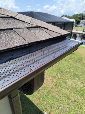 Custom Seamless Gutters and Downspouts for Large Homes in Tampa FL by Gutter Professor