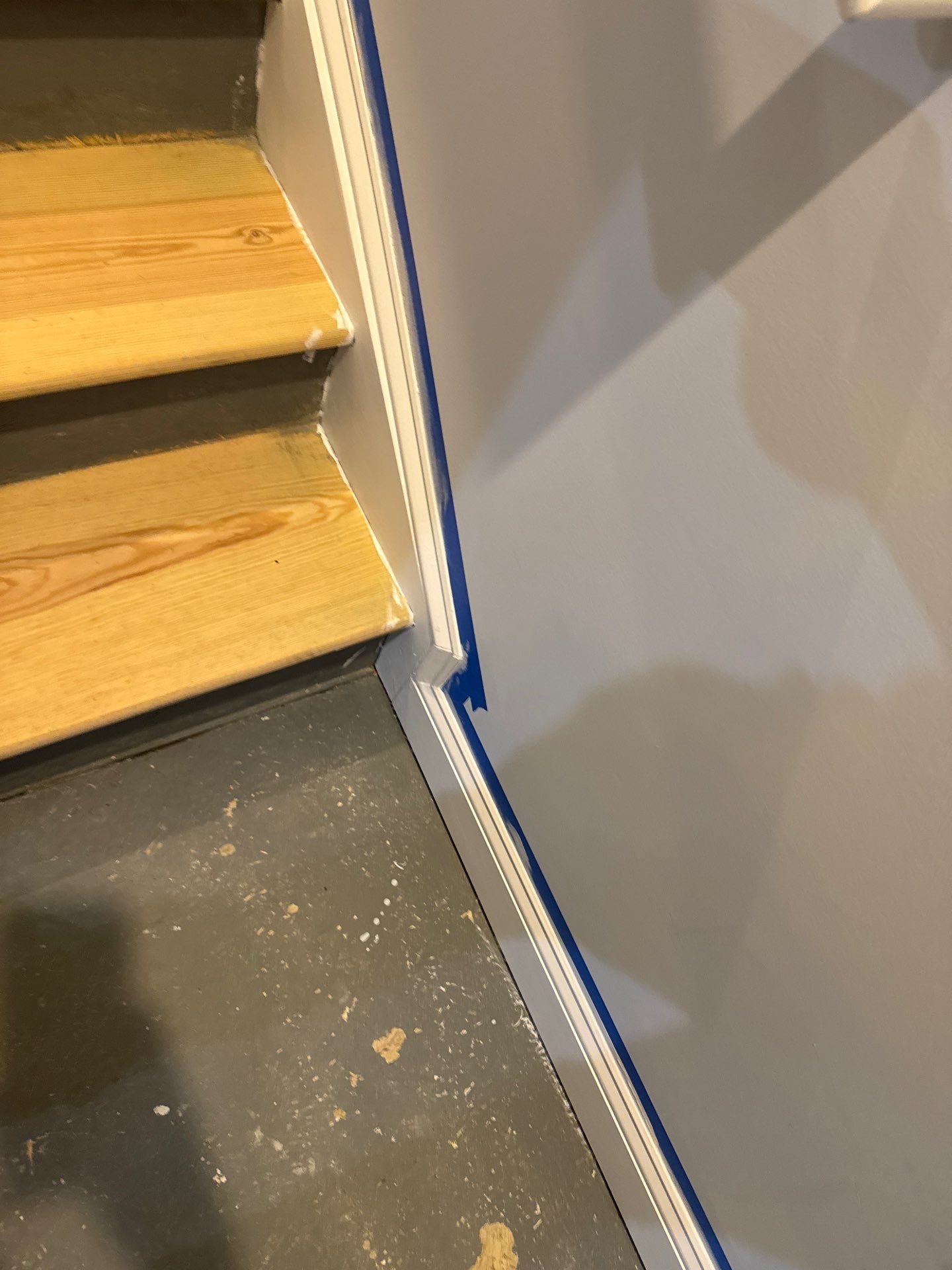Stairway Installation using t vinyl stair tread and reversibleriser by La Bendicion Contruction Llc