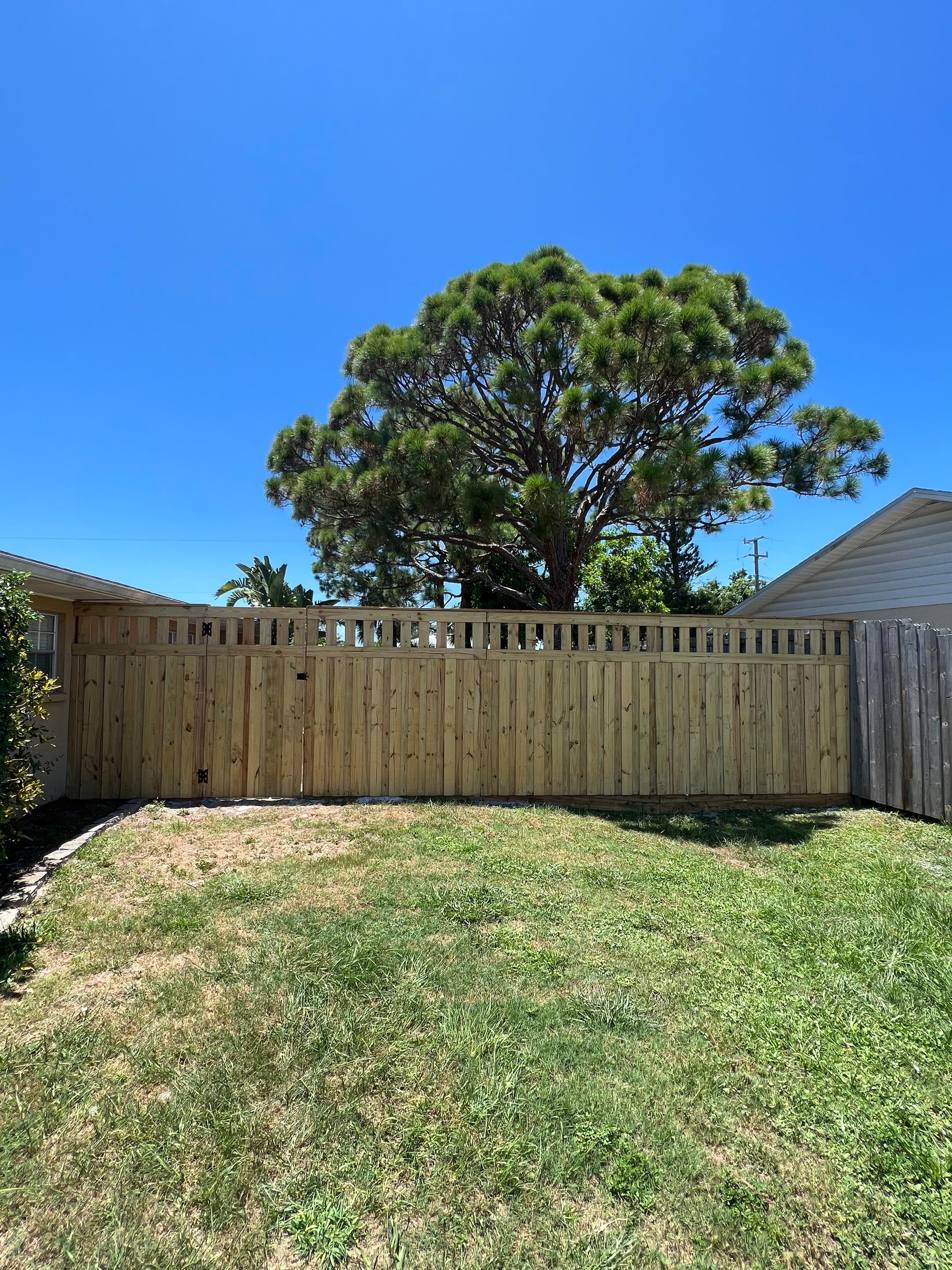 Wood Fence Installation using Board on Board Wood Fence by Asap fence and gates, LLC