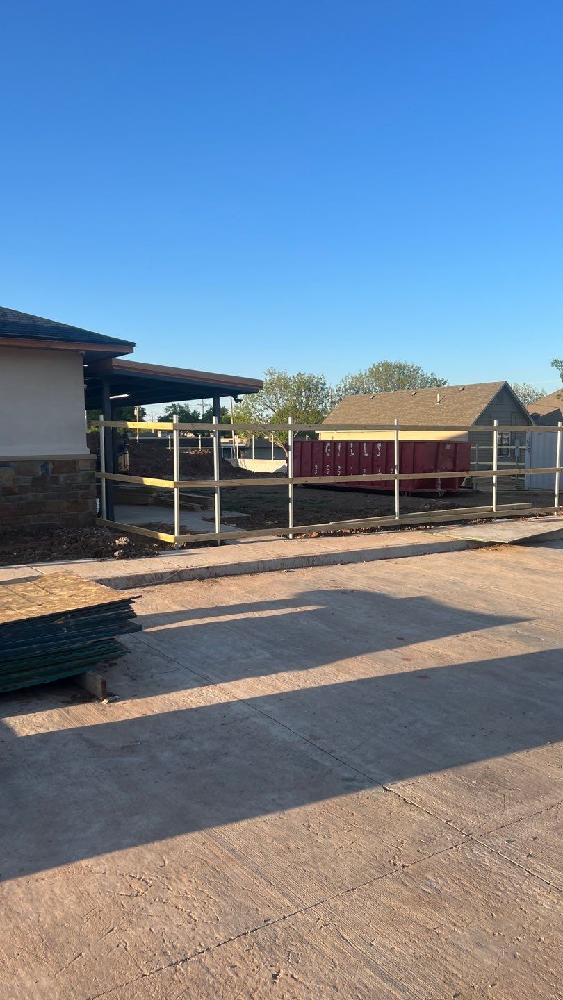 Cedar Fence using Cedar Pickets and Metal Poles by Clays Services Inc
