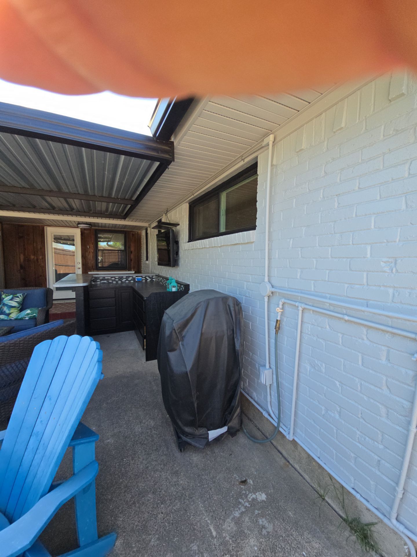 Exterior Home Paint Project with Different Surfaces by SLM General Contractors & Roofing