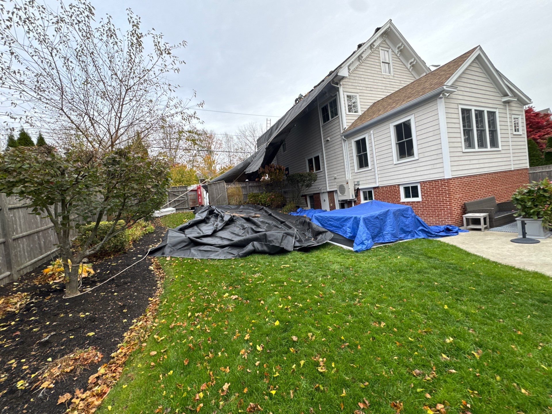 Newburyport Complete Roof Replacement with Solar Venting Skylight by Mighty Dog Roofing of Greater Middlesex County