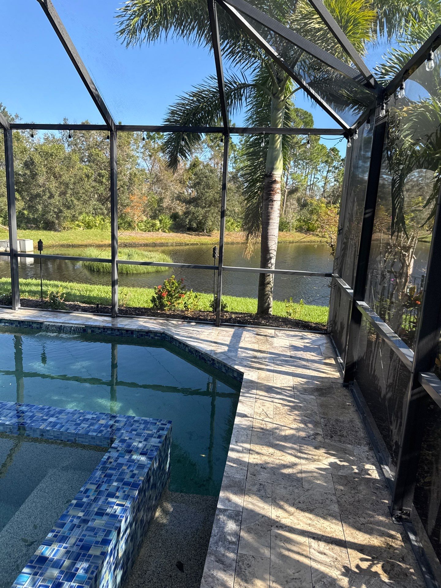 Travertine Pool Deck and Screen Enclosure Cleaning in Ellenton, FL | Oakleaf Hammock Community by Sunshine AquaWash