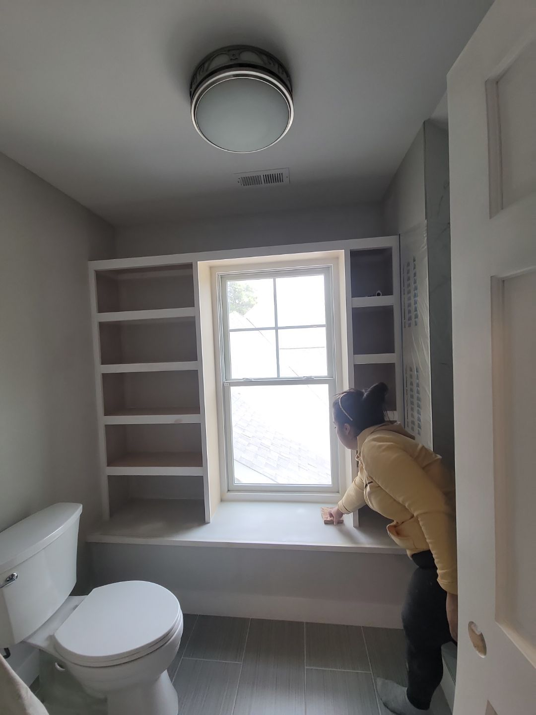 From Rafters to Retreat: An Attic Transformed with a Luxe Bath Escape by Elite Remodeling and Design LLC
