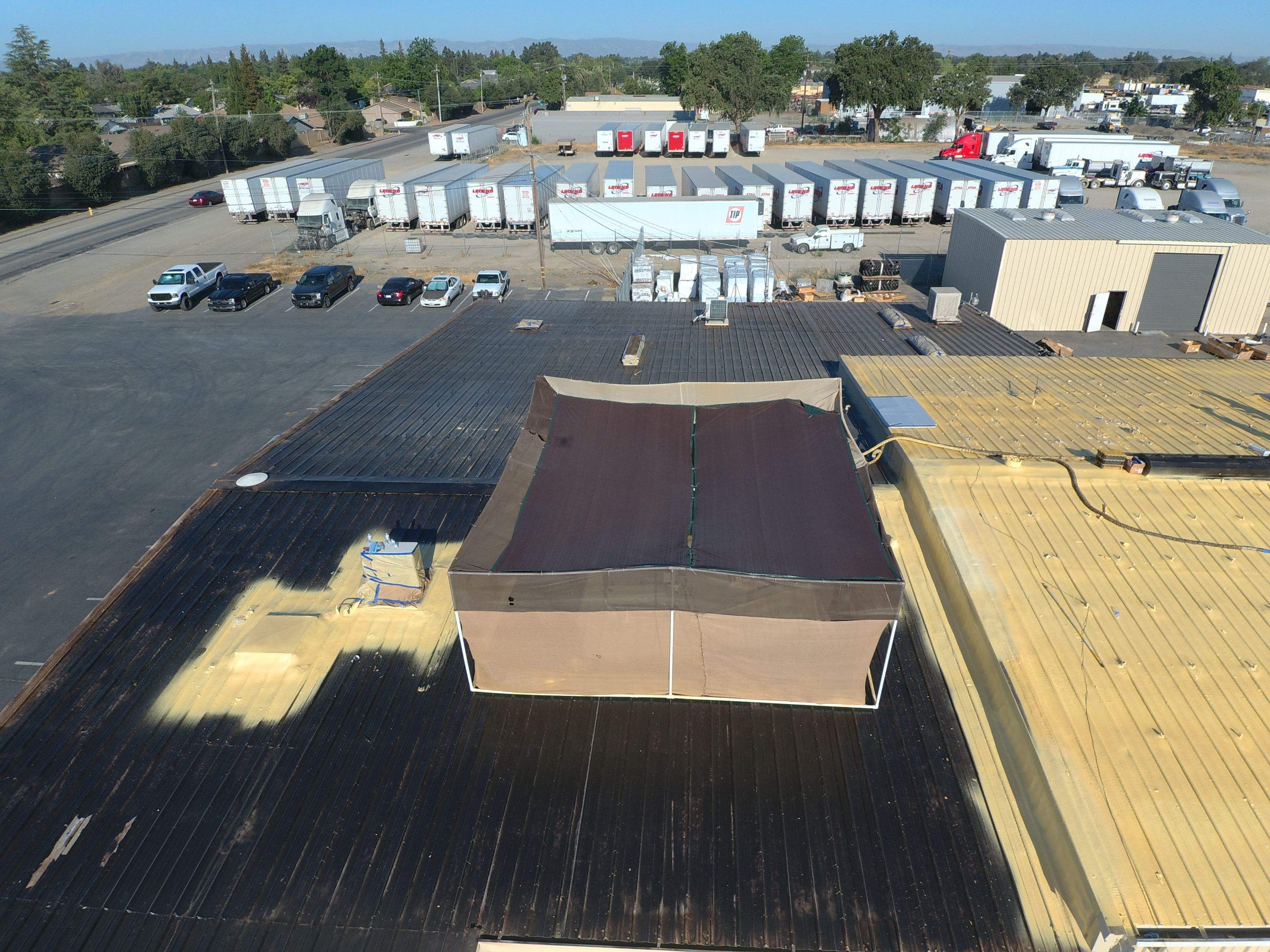 Spray foam and coatings using Conklin Benchmark/PUMA XL coatings and spray foam by Straight Edge Roofing Inc