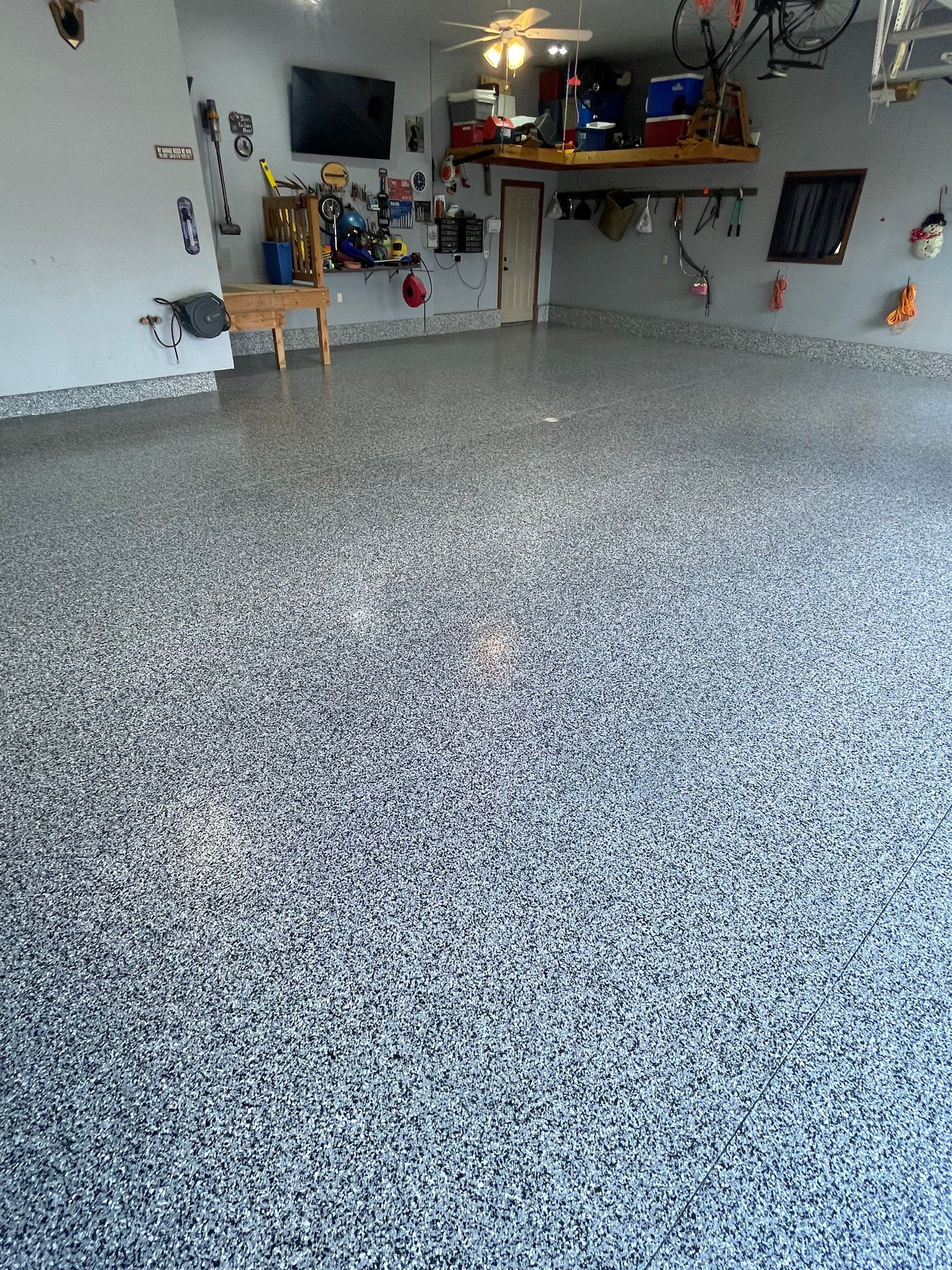 Residential Garage Floor Coating in Sioux Falls by Select Painting, Coatings & Garage Cabinets