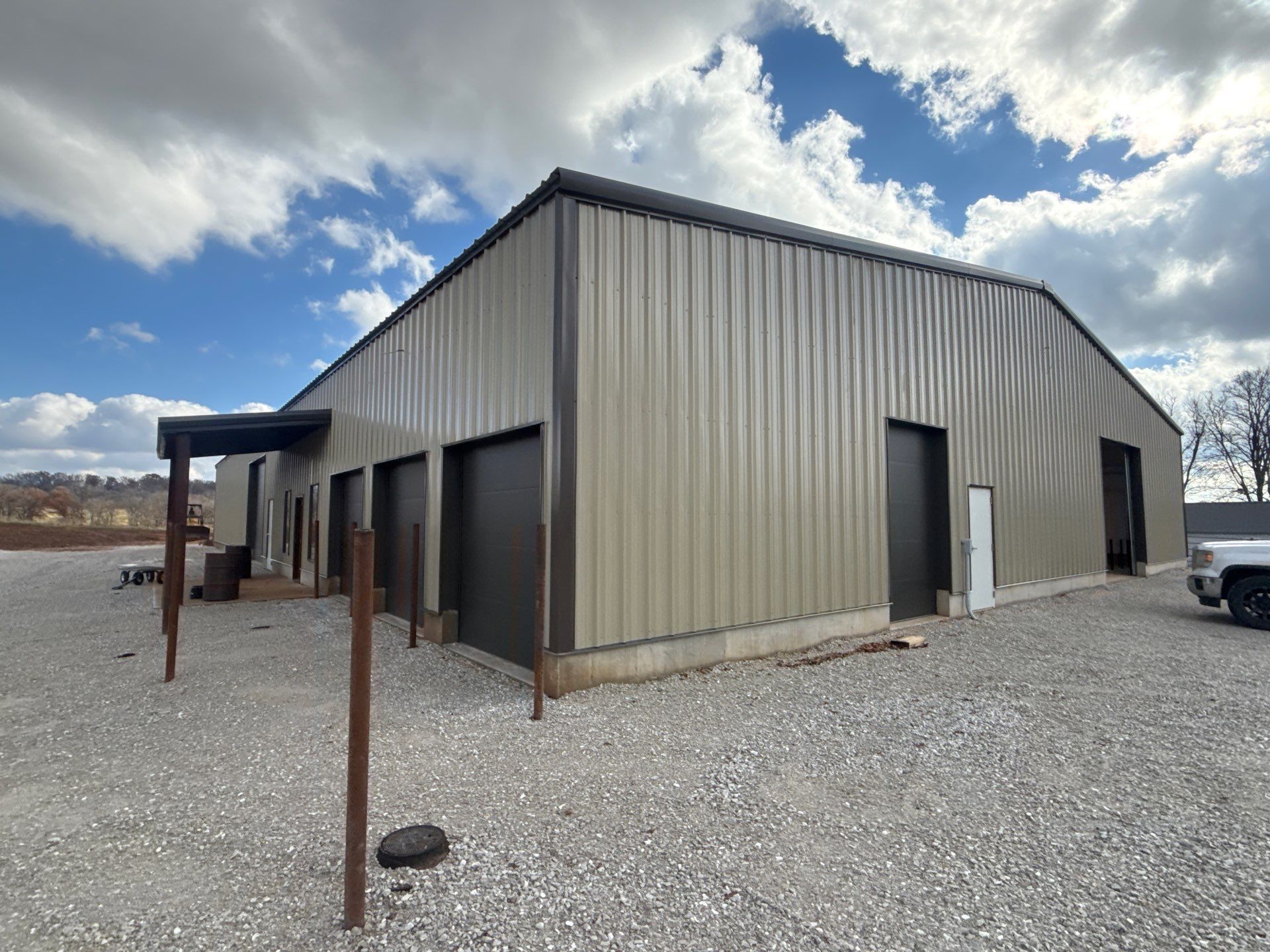 Metal Shop 6" Gutters & Downspouts Install - Color Musket Brown  by Titan Commercial & Residential Roofing 
