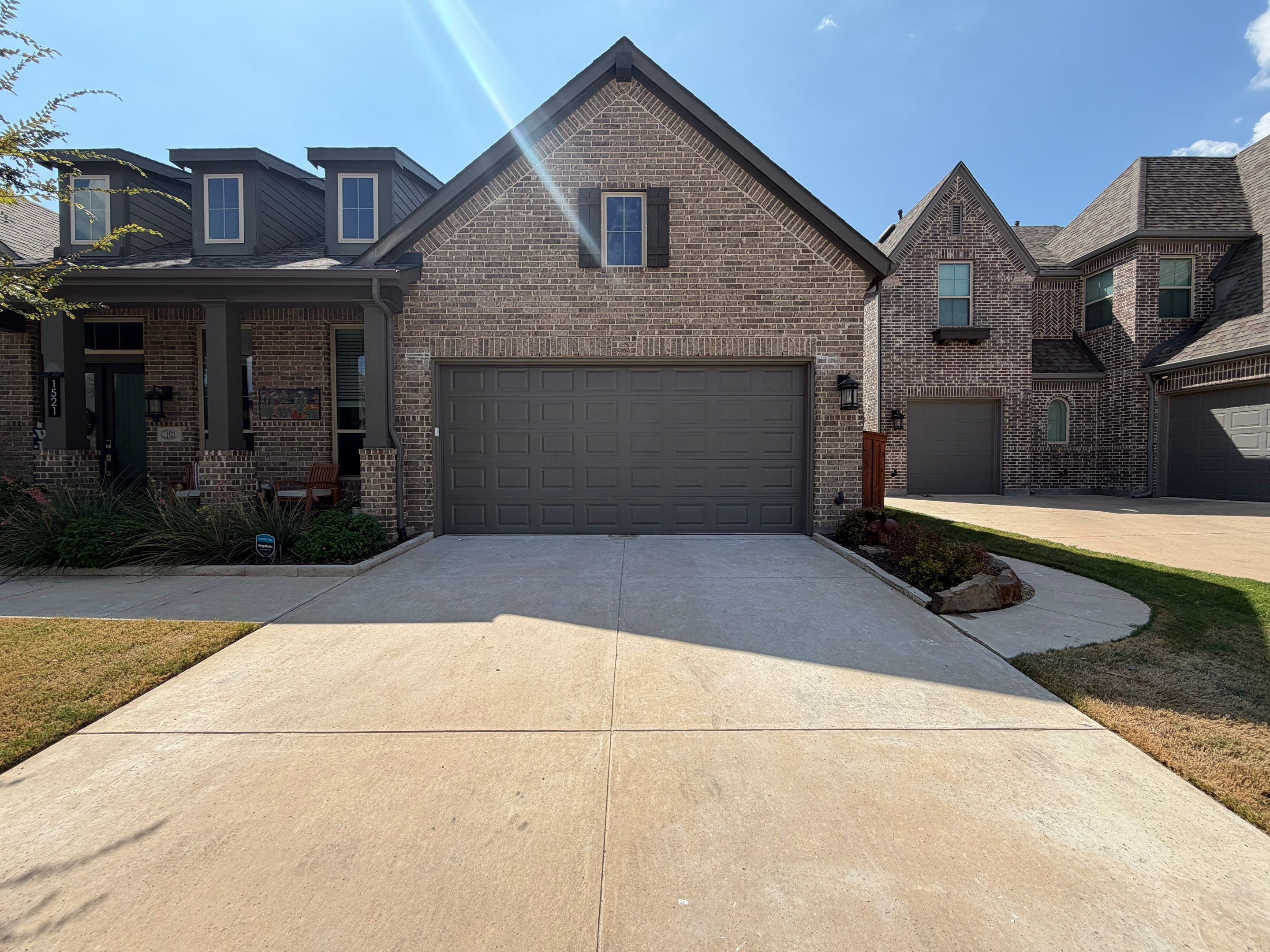 Garage Door Center Post Conversion in Aubrey, Texas by Meadows Garage Doors