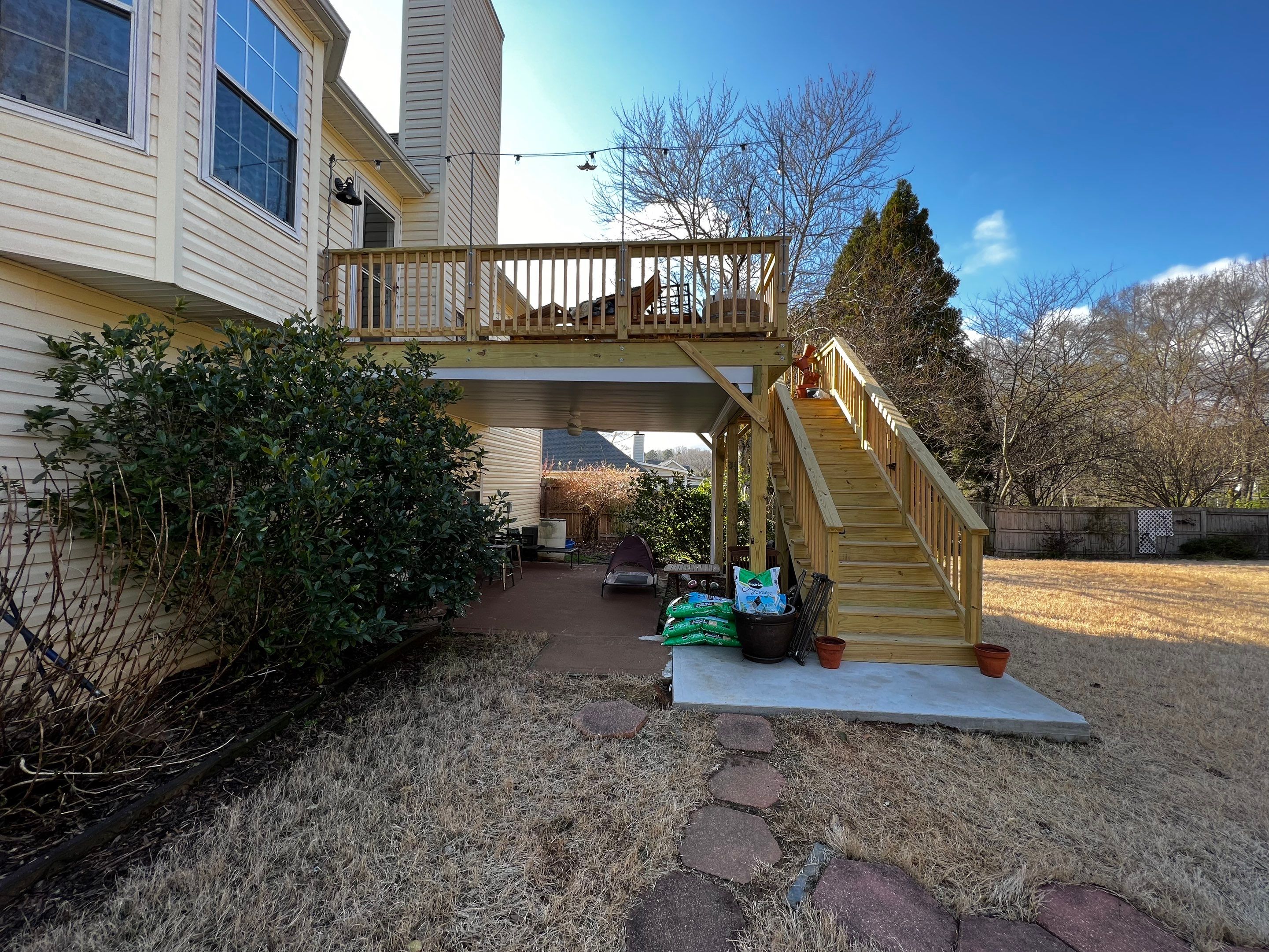 Elevated Wooden Deck Replacement and Under-Deck Ceiling in Cartersville by Swift Home Renovations