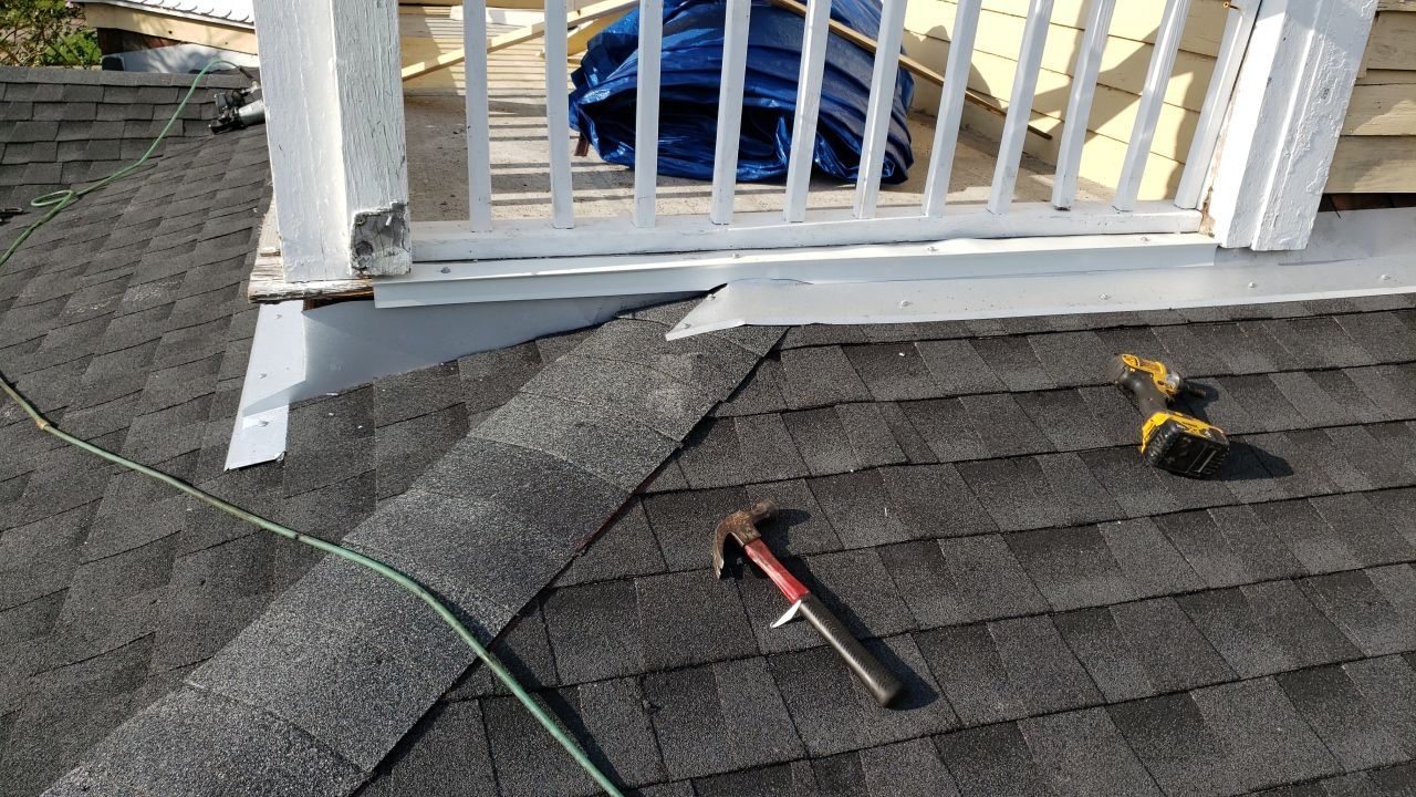 Residential Roofing Installation using Roof Replacement by American Roofing & Construction LLC