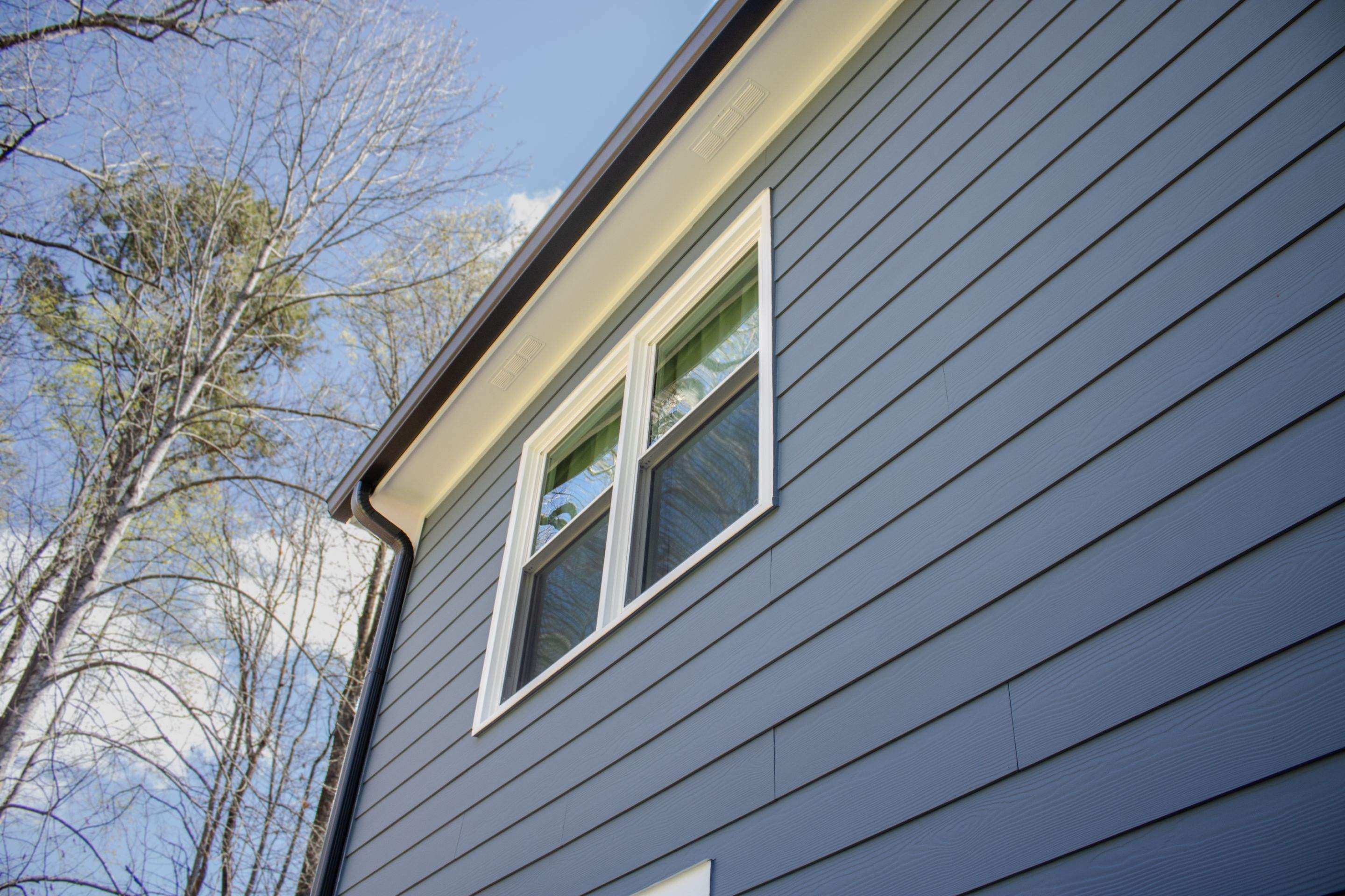 Marietta, GA Full Siding Replacement, 30+ Window Replacements, Screened-In Porch to Sunroom Conversion, Gutter Replacement, and Exterior Painting by Nelson Exteriors