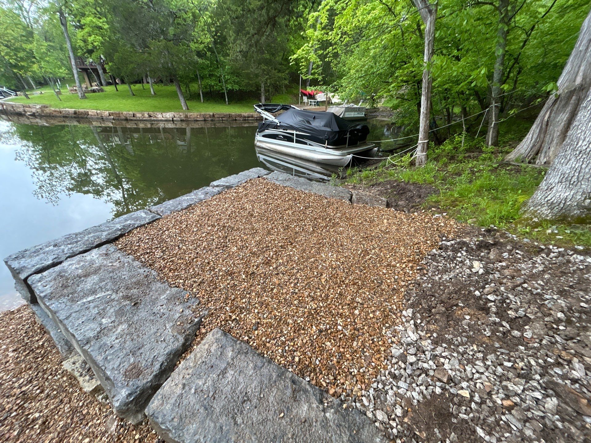 Lakeside Deck & Fire Pit by Loch Ness Landscaping, LLC