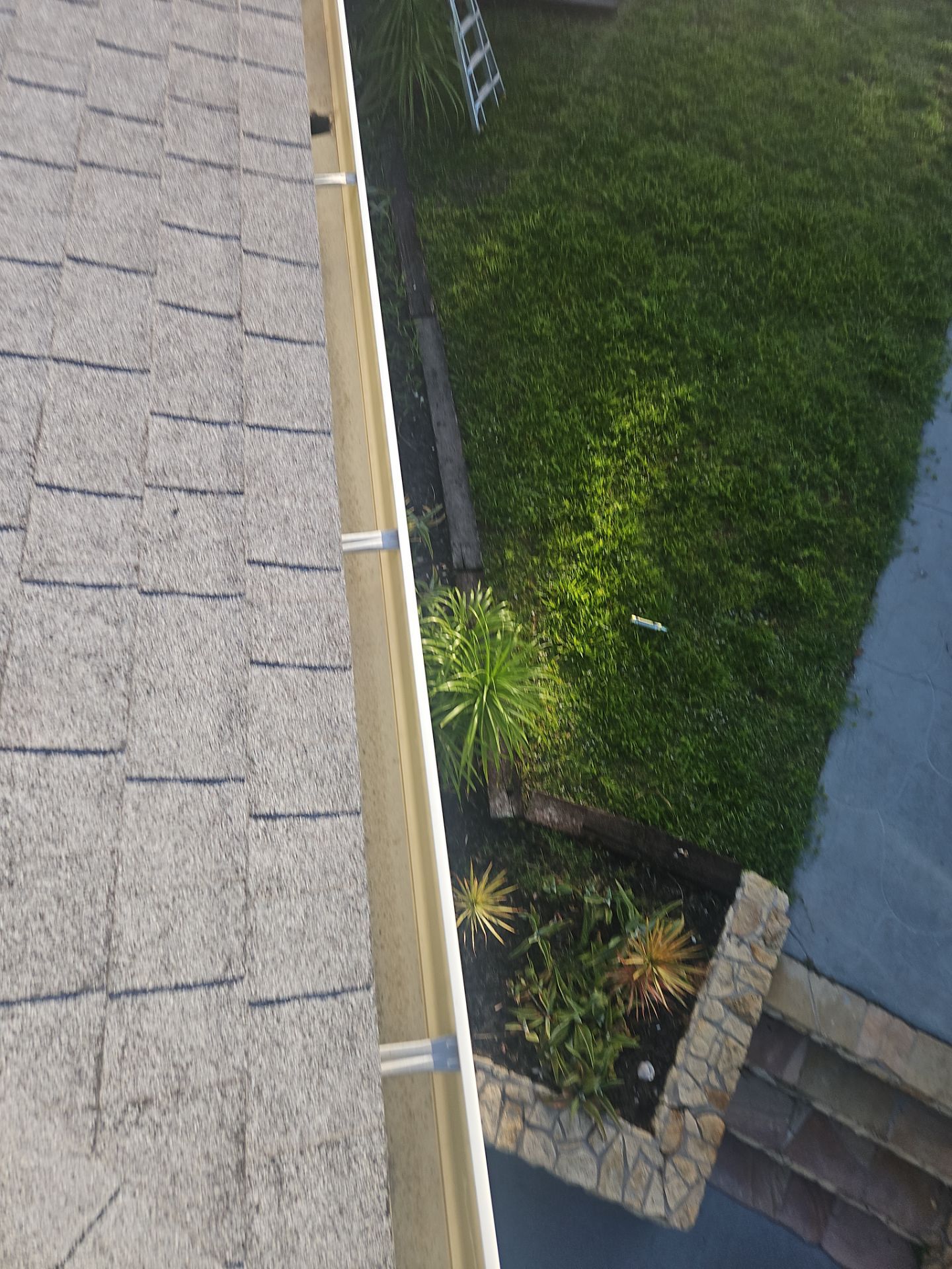 Cleaning Gutters in Sarasota FL by Gutter Professors